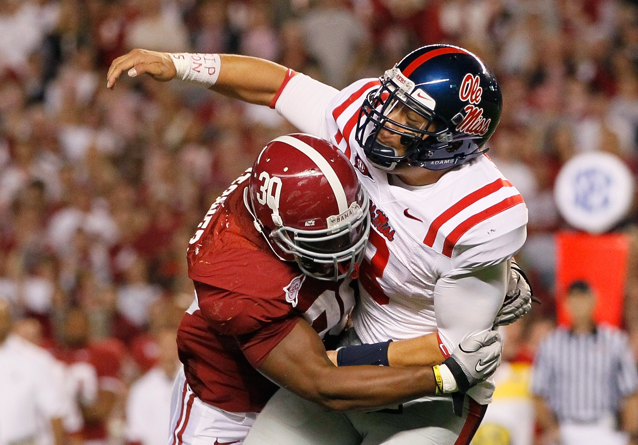 TUSCALOOSA, AL - OCTOBER 16:  Dont'a Hightower #30 of the Alabama Crimson Tide pressures quarterback Jeremiah Masoli #8 of the Ole Miss Rebels at Bryant-Denny Stadium on October 16, 2010 in Tuscaloosa, Alabama.  (Photo by Kevin C. Cox/Getty Images)