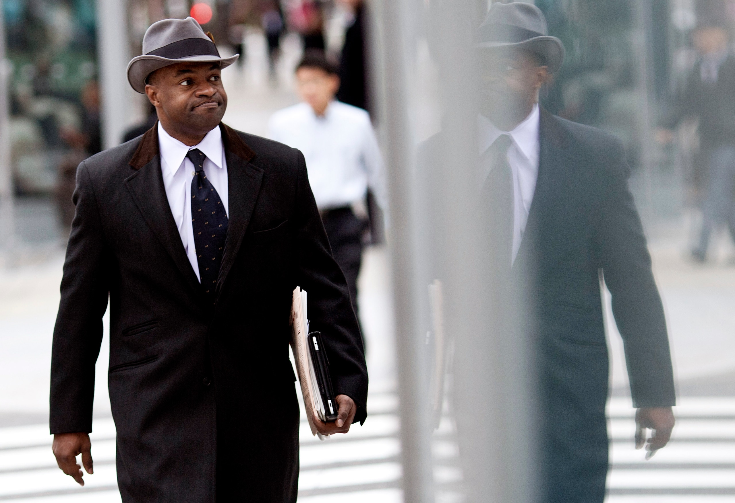 WASHINGTON - MARCH 9:  DeMaurice Smith (R), NFL Players Association Executive Director, returns to the Federal Mediation and Conciliation Service building after a break March 9, 2011 in Washington, DC.  Representatives from the National Football League (N