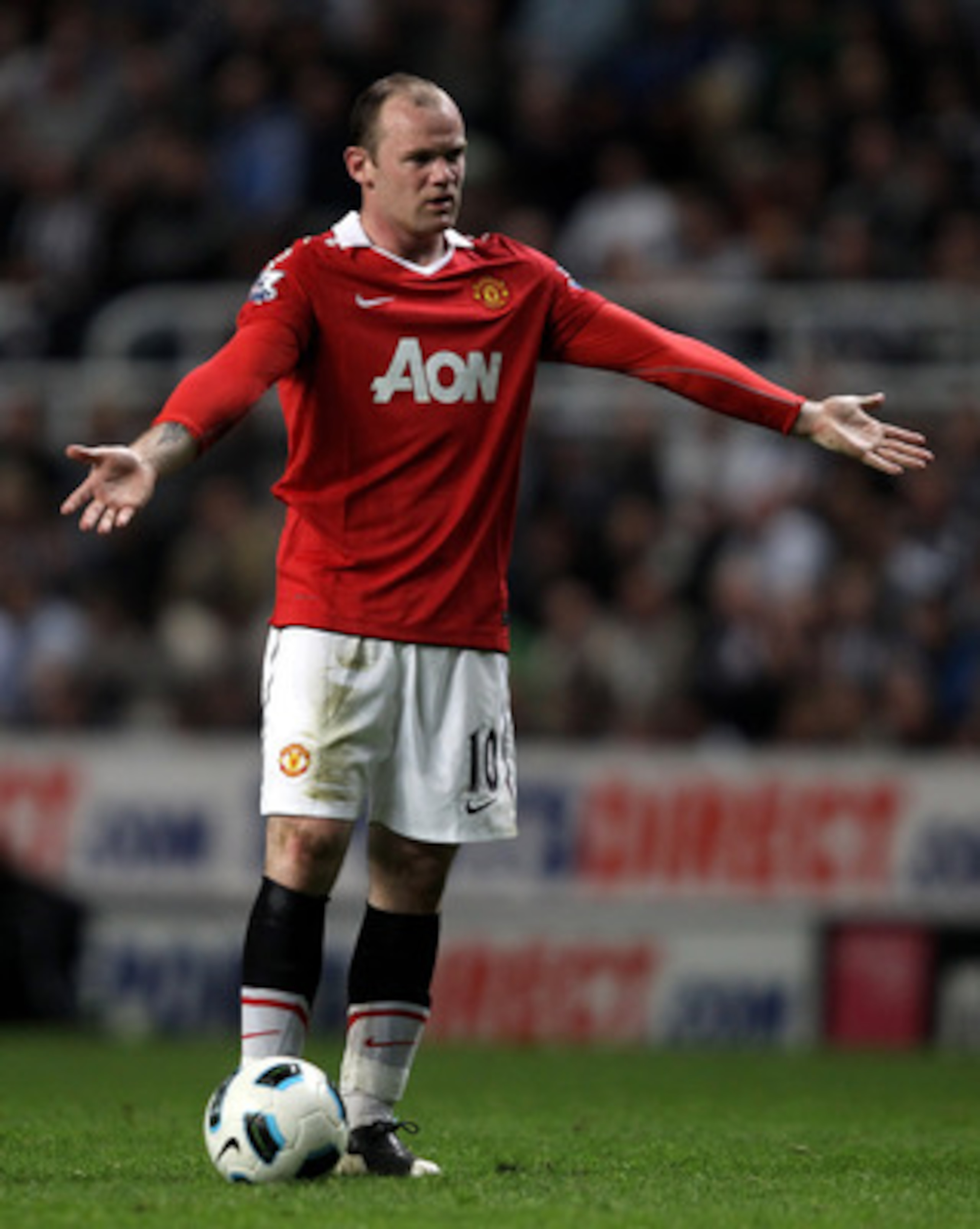 NEWCASTLE, UNITED KINGDOM - APRIL 19:  Wayne Rooney of Manchester United gestures during the Barclays Premier League match between Newcastle United and Manchester United at St James' Park on April 19, 2011 in Newcastle, England. (Photo by Clive Brunskill/