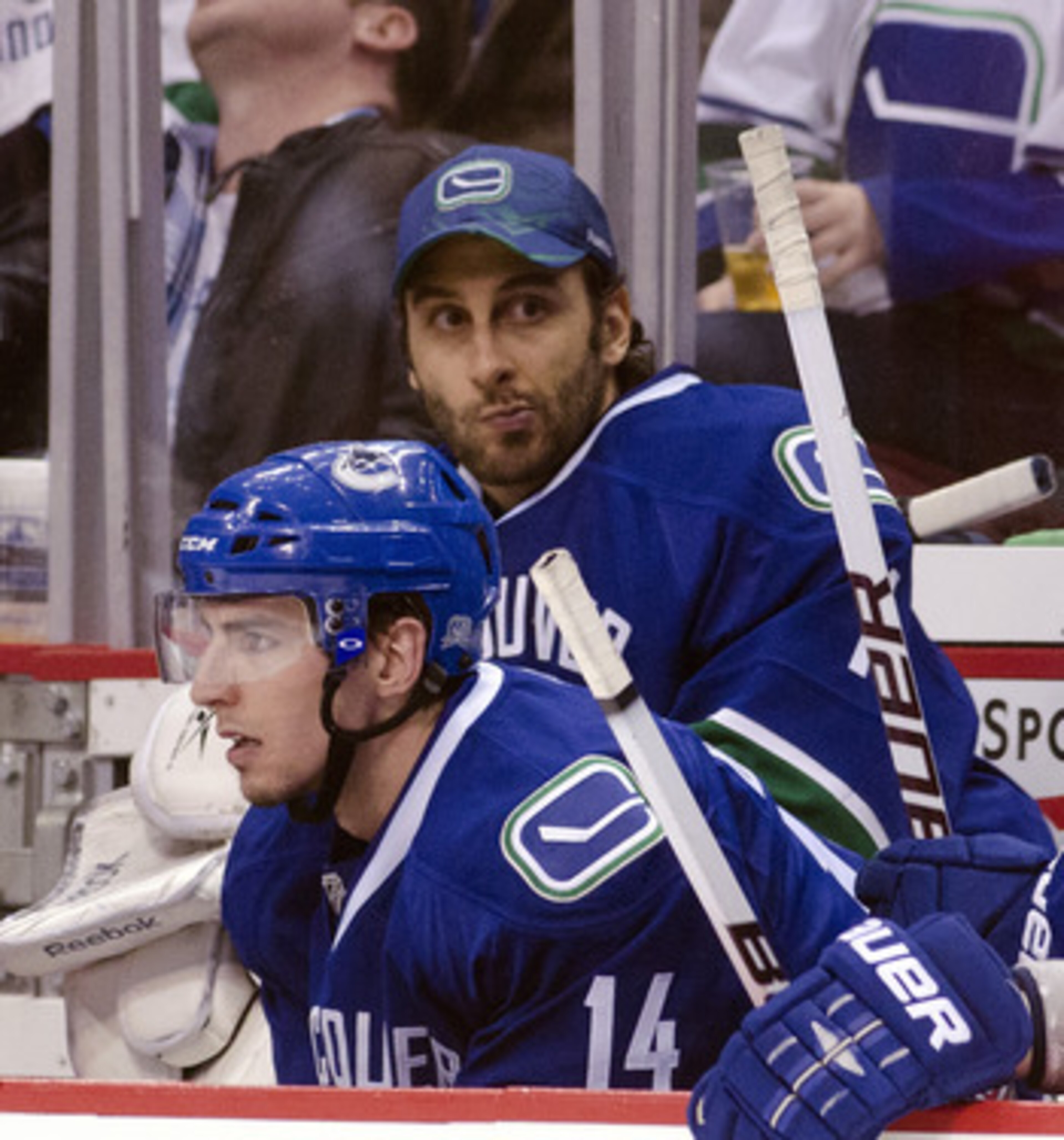 VANCOUVER, CANADA - APRIL 21: Goalie Roberto Luongo #1 of the Vancouver Canucks watches the third period of Game Five of the Western Conference Quarterfinals against the Chicago Blackhawks from the bench with Alexandre Burrows #14 during the 2011 NHL Stan VANCOUVER, CANADA - APRIL 21: Goalie Roberto Luongo #1 of the Vancouver Canucks watches the third period of Game Five of the Western Conference Quarterfinals against the Chicago Blackhawks from the bench with Alexandre Burrows #14 during the 2011 NHL Stan