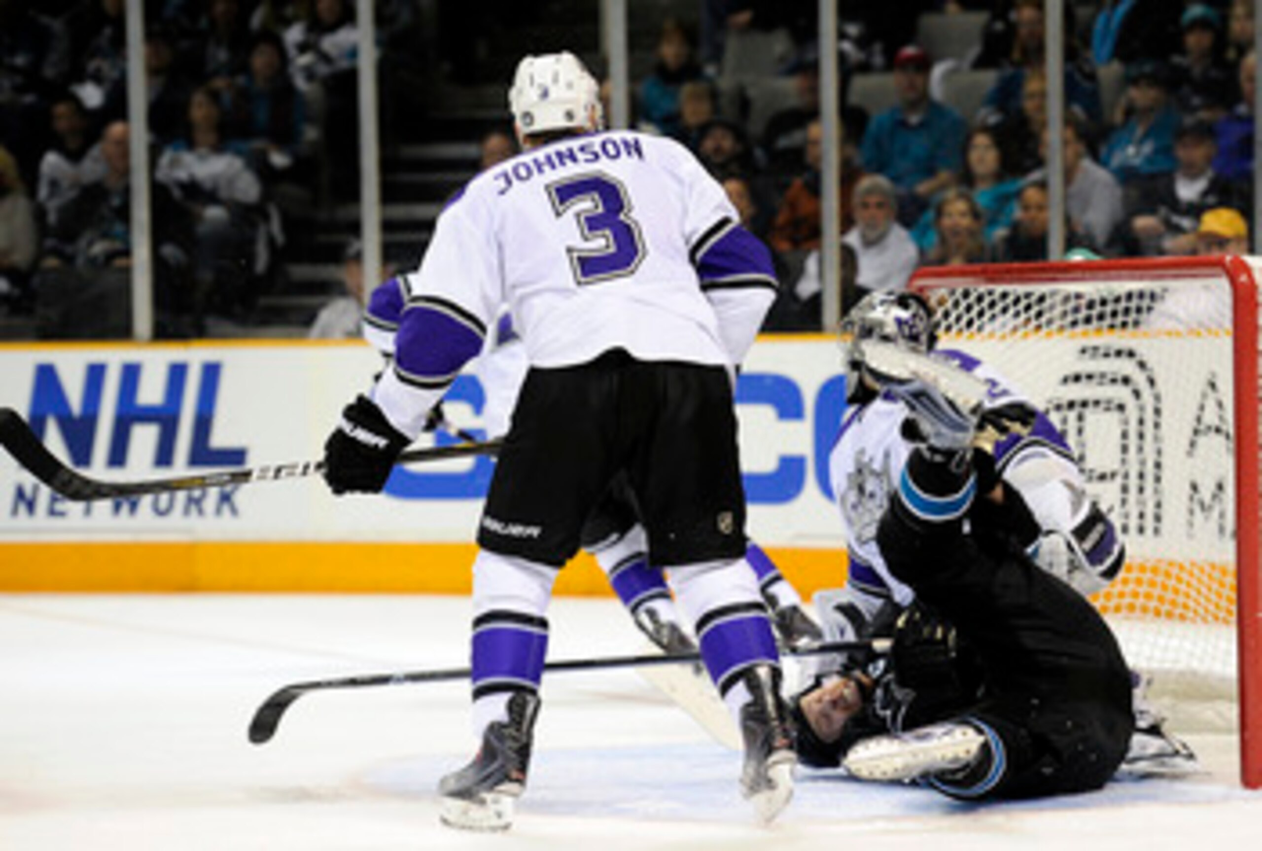 SAN JOSE, CA - APRIL 16: Jack Johnson #3 of the Los Angeles Kings checks Joe Thornton #19 of the San Jose Sharks to the ice in Game Two of the Western Conference Quarterfinals during the 2011 NHL Stanley Cup Playoffs at the HP Pavilion on April 16, 2011 i
