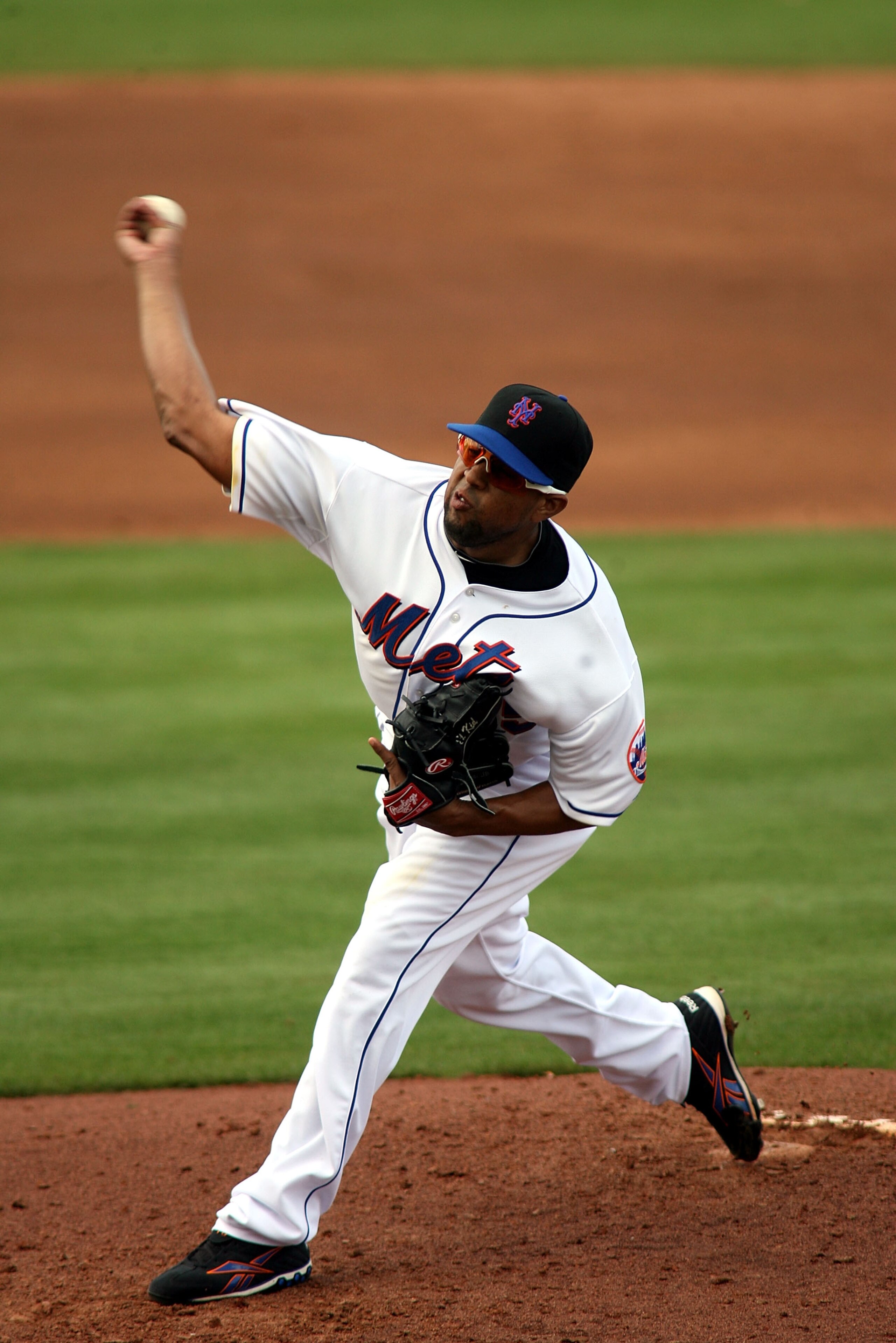 PORT ST. LUCIE, FL - MARCH 03:    Pitcher Francisco Rodriguez #75 of the New York Mets throws against the St. Louis Cardinals at Digital Domain Park on March 3, 2011 in Port St. Lucie, Florida.  (Photo by Marc Serota/Getty Images)