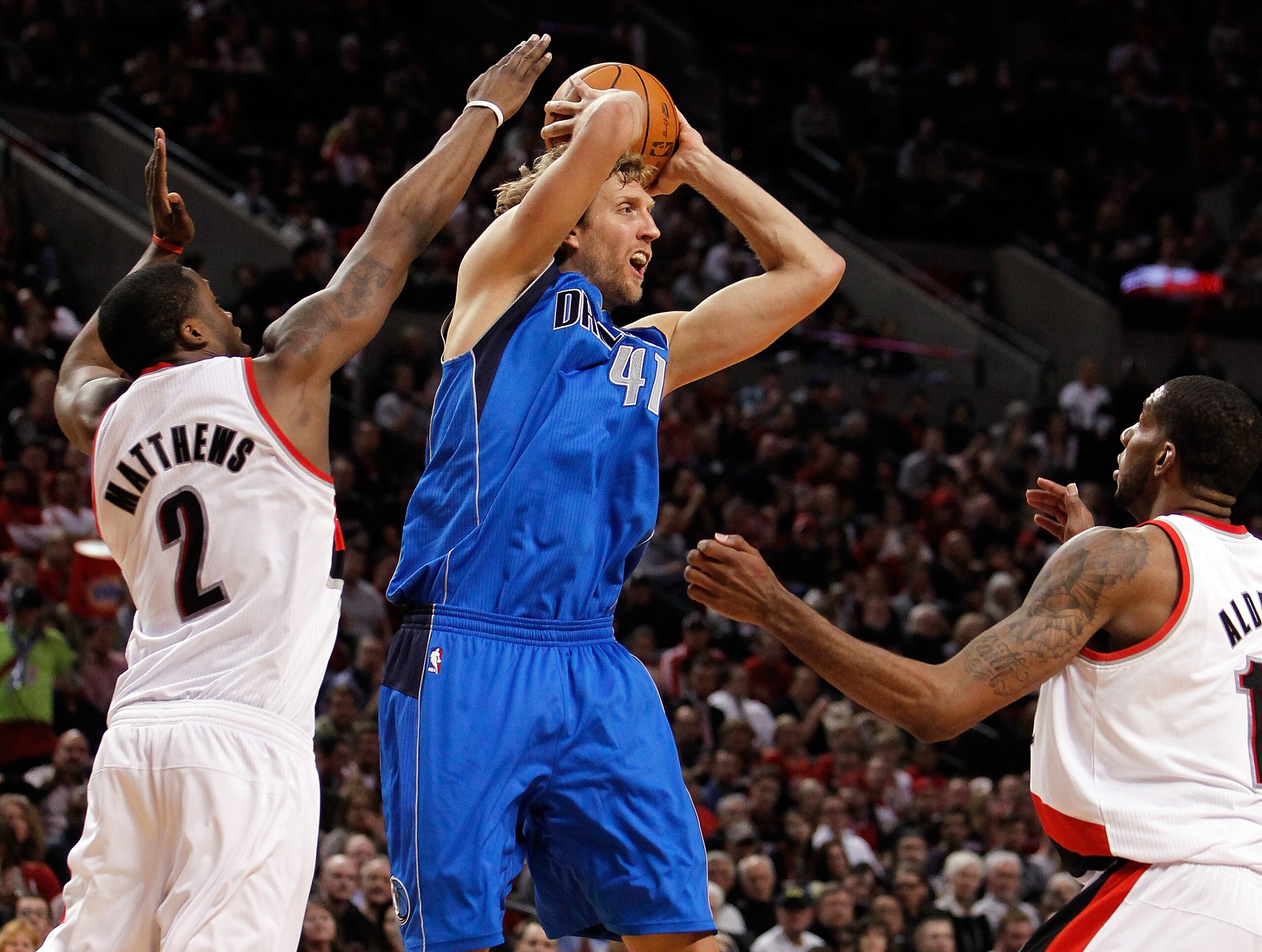 PORTLAND, OR - APRIL 21:  Wesley Matthews #2 of the Portland Trail Blazers guards Dirk Nowitzki #41 of the Dallas Mavericks in Game Three of the Western Conference Quarterfinals in the 2011 NBA Playoffs on April 21, 2011 at the Rose Garden in Portland, Or