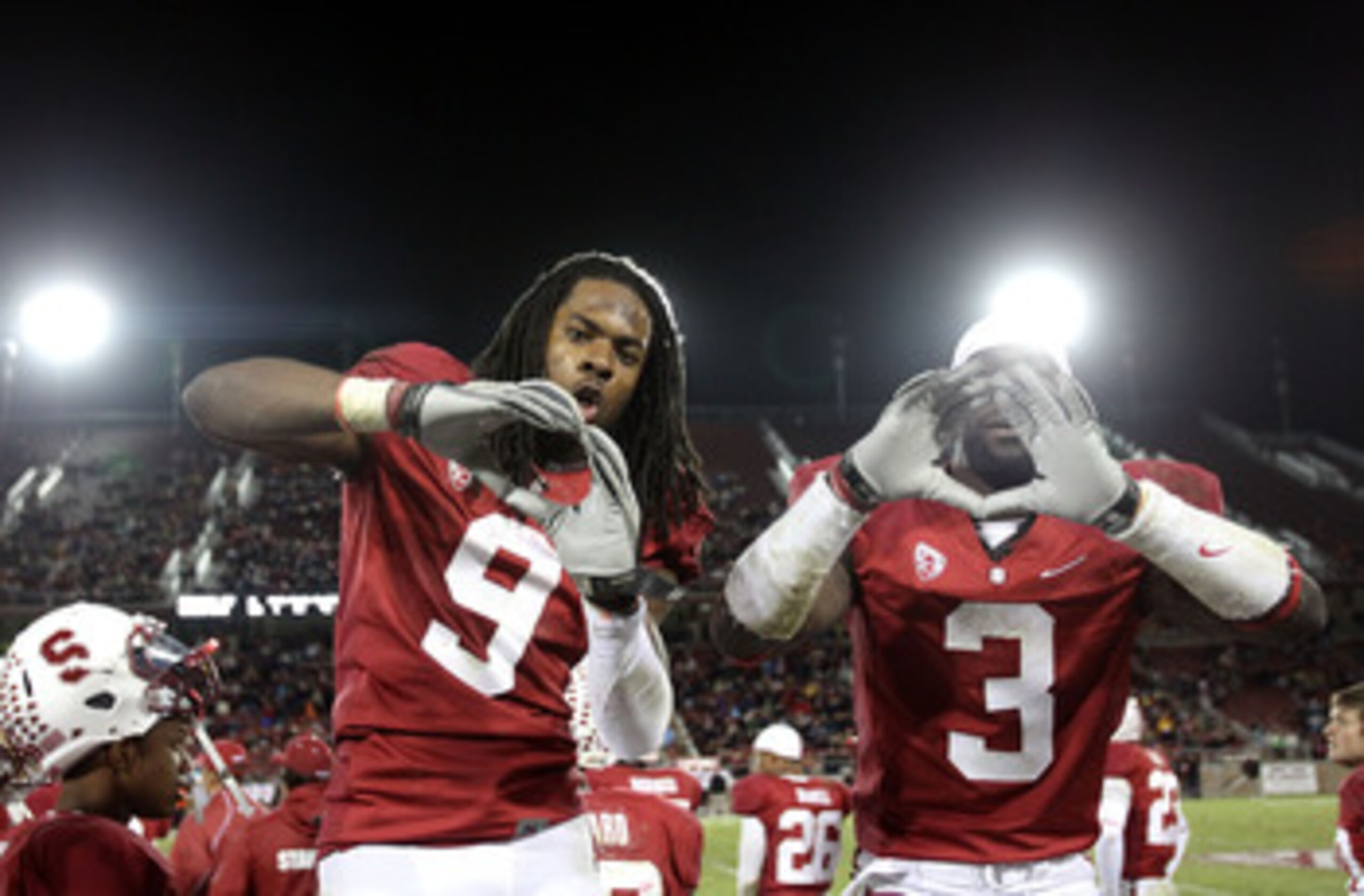 PALO ALTO, CA - NOVEMBER 27:  Michael Thomas #3 and Richard Sherman #9 of the Stanford Cardinal celebrate after they beat the Oregon State Beavers at Stanford Stadium on November 27, 2010 in Palo Alto, California.  (Photo by Ezra Shaw/Getty Images)