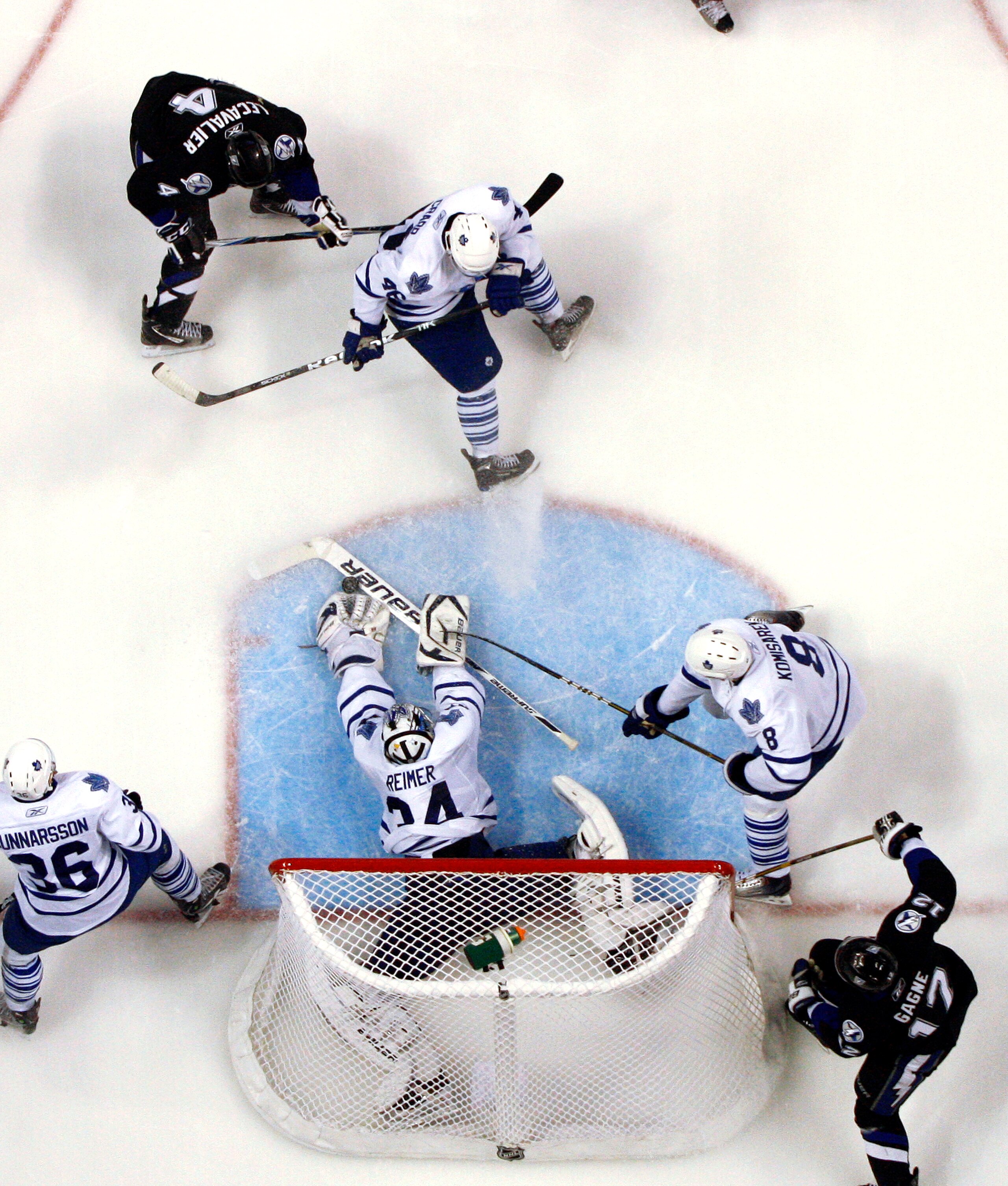 TAMPA, FL - JANUARY 25:  James Reimer #34 of the Toronto Maple Leafs makes a save against the Tampa Bay Lightning at St. Pete Times Forum on January 25, 2011 in Tampa, Florida.  The Lightning defeated the Leafs 2-0.  (Photo by Justin K. Aller/Getty Images