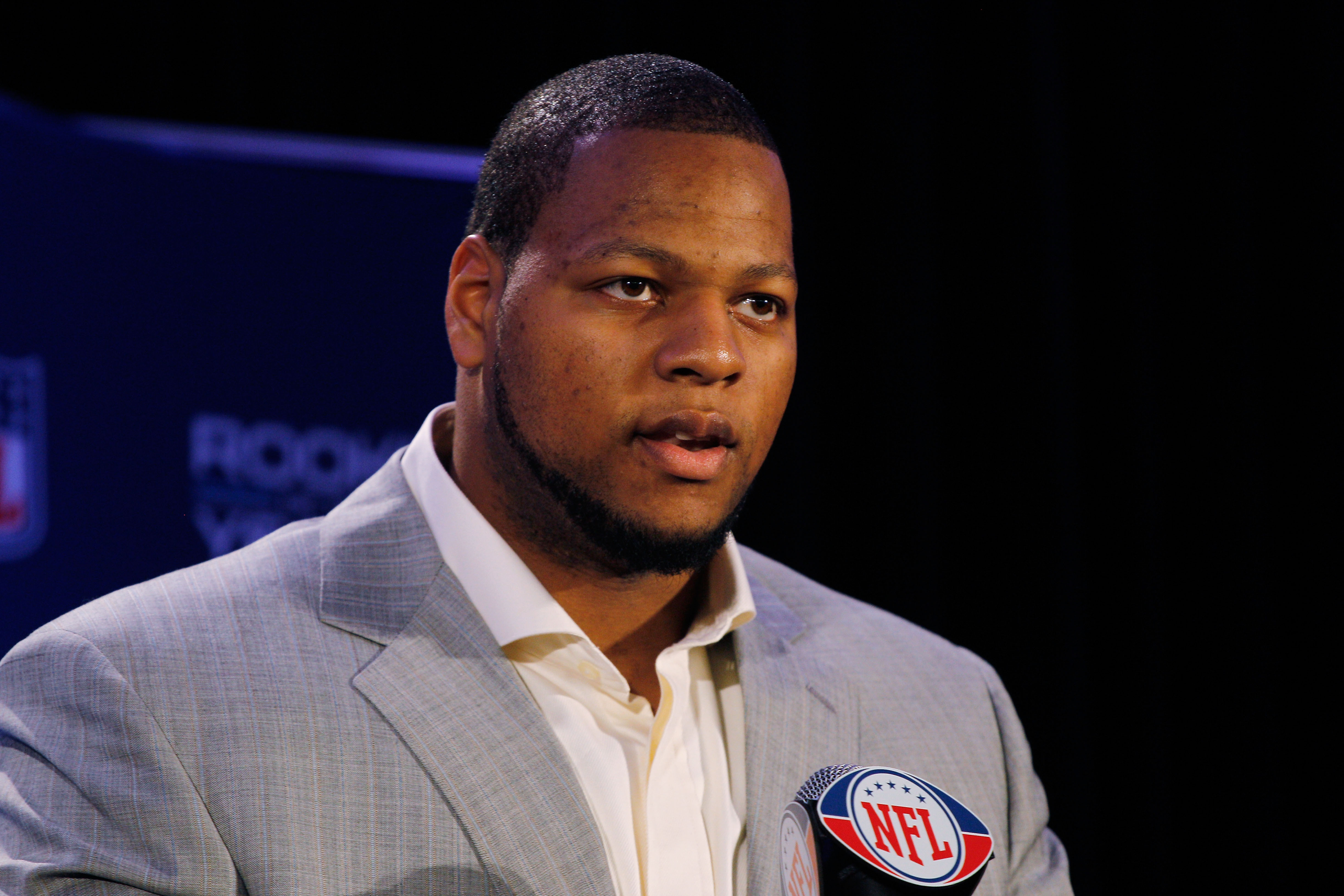 DALLAS, TX - FEBRUARY 03: Ndamukong Suh #90 of the Detroit Lions speaks during a press conference where he accepted Pepsi's 2010 NFL Rookie of the Year Award at the Super Bowl XLV media center on February 3, 2011 in Dallas, Texas. The Green Bay Packers w DALLAS, TX - FEBRUARY 03: Ndamukong Suh #90 of the Detroit Lions speaks during a press conference where he accepted Pepsi's 2010 NFL Rookie of the Year Award at the Super Bowl XLV media center on February 3, 2011 in Dallas, Texas. The Green Bay Packers w