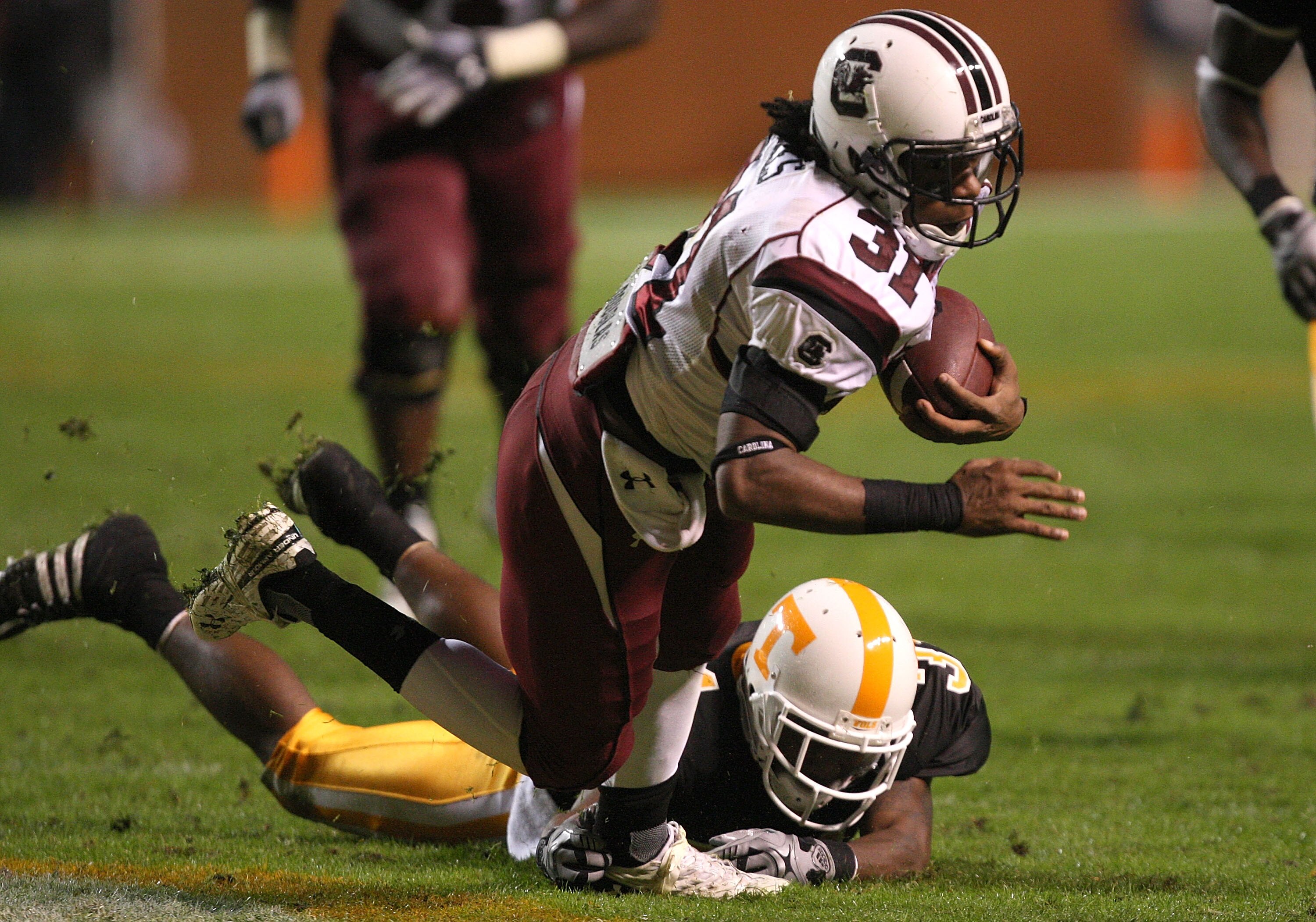 KNOXVILLE, TN - OCTOBER 31:  Kenny Miles #31 of the South Carolina Gamecocks goes down with the ball against the Tennessee Volunteers at Neyland Stadium on October 31, 2009 in Knoxville, Tennessee.  (Photo by Streeter Lecka/Getty Images)