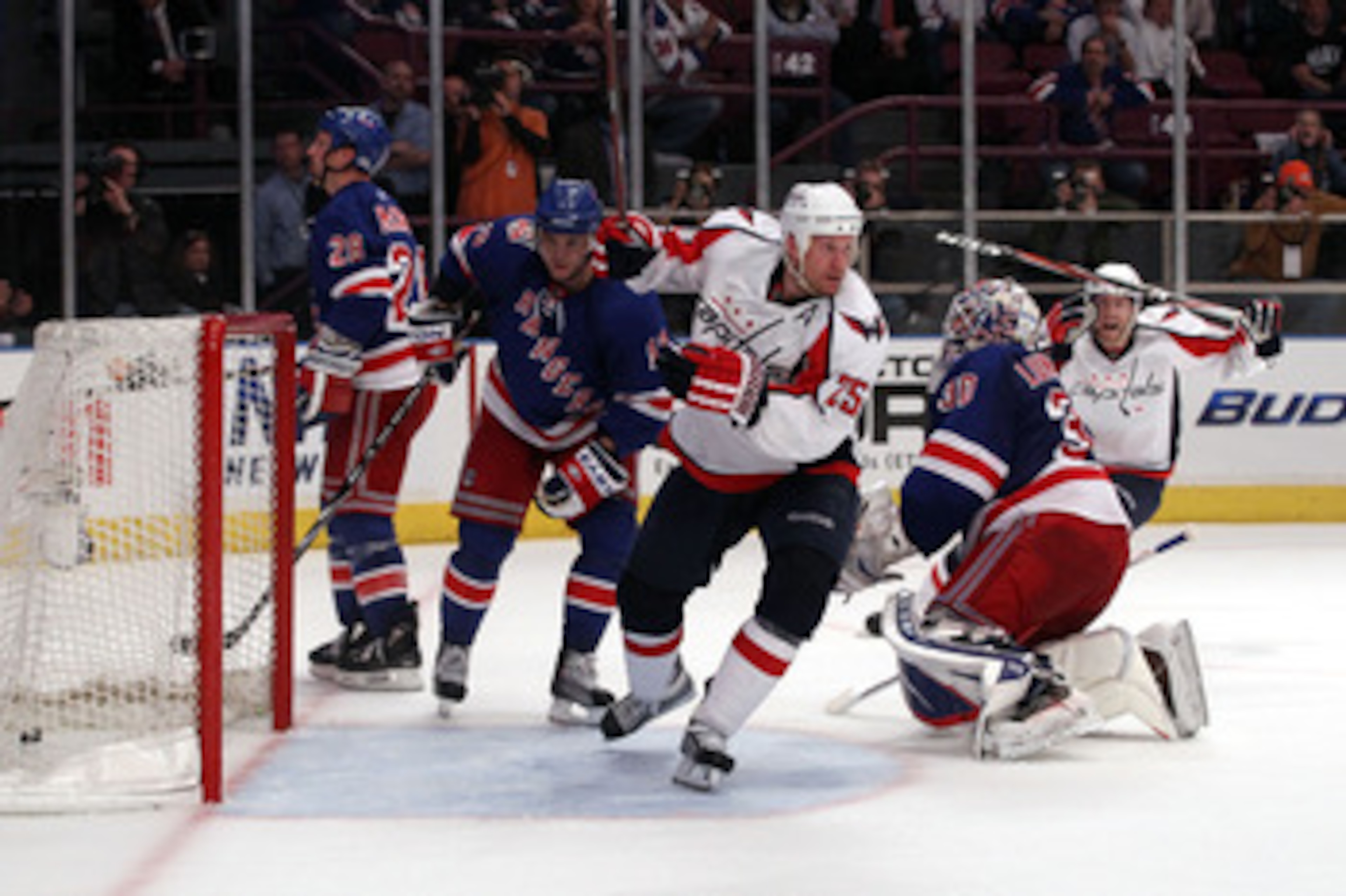 NEW YORK, NY - APRIL 20: Jason Chimera #25 of the Washington Capitals celebrates after he scored the game-winning goal in the second overtime period to give the Capitals a 4-3 win against Marian Gaborik #10 (2nd L) and goalie Henrik Lundqvist #30 of the NEW YORK, NY - APRIL 20: Jason Chimera #25 of the Washington Capitals celebrates after he scored the game-winning goal in the second overtime period to give the Capitals a 4-3 win against Marian Gaborik #10 (2nd L) and goalie Henrik Lundqvist #30 of the