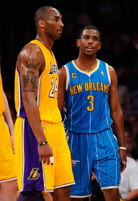 LOS ANGELES, CA - APRIL 20:  Kobe Bryant #24 of the Los Angeles Lakers stands next to Chris Paul #3 of the New Orleans Hornets in Game Two of the Western Conference Quarterfinals in the 2011 NBA Playoffs on April 20, 2011 at Staples Center in Los Angeles,