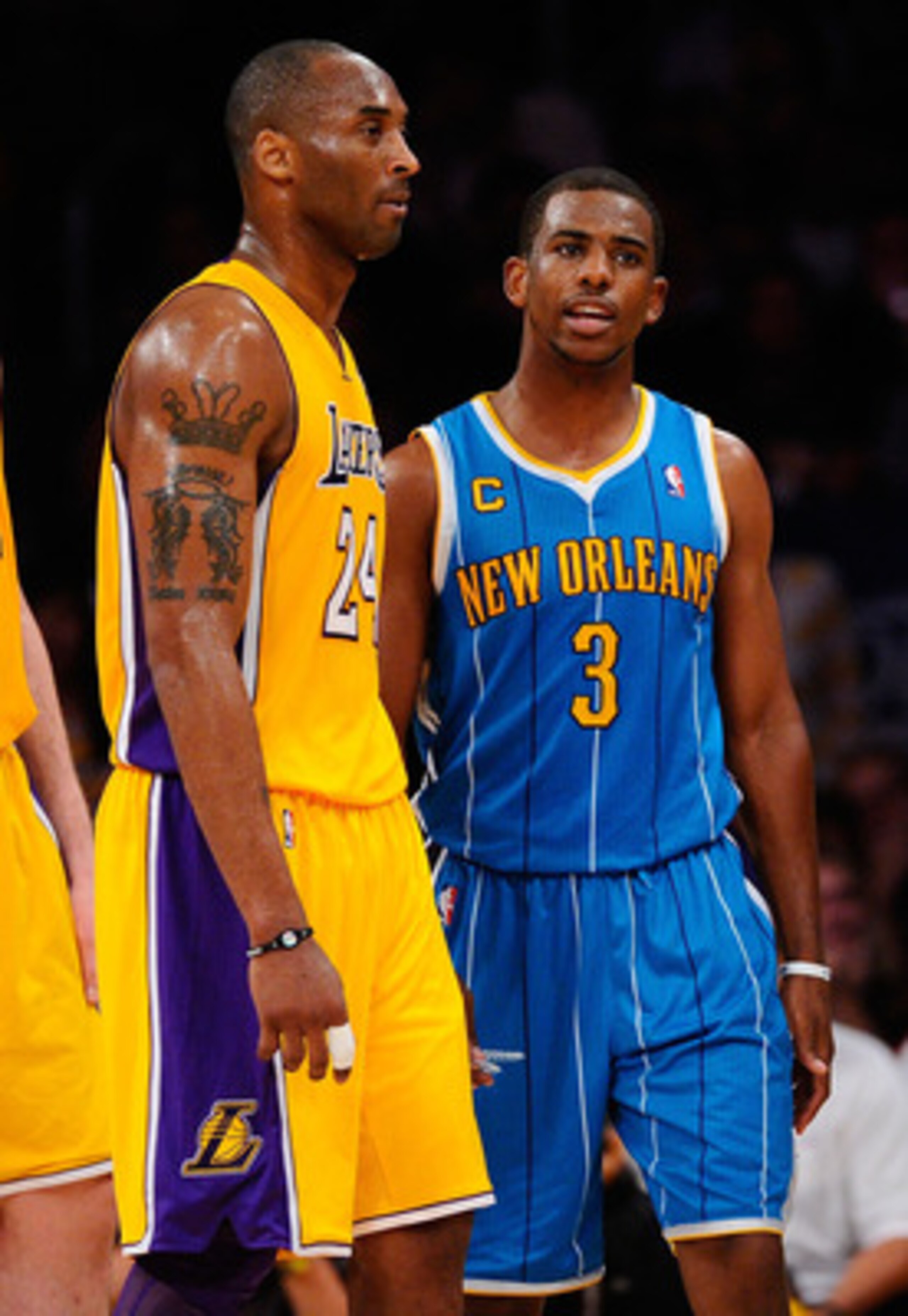 LOS ANGELES, CA - APRIL 20:  Kobe Bryant #24 of the Los Angeles Lakers stands next to Chris Paul #3 of the New Orleans Hornets in Game Two of the Western Conference Quarterfinals in the 2011 NBA Playoffs on April 20, 2011 at Staples Center in Los Angeles,