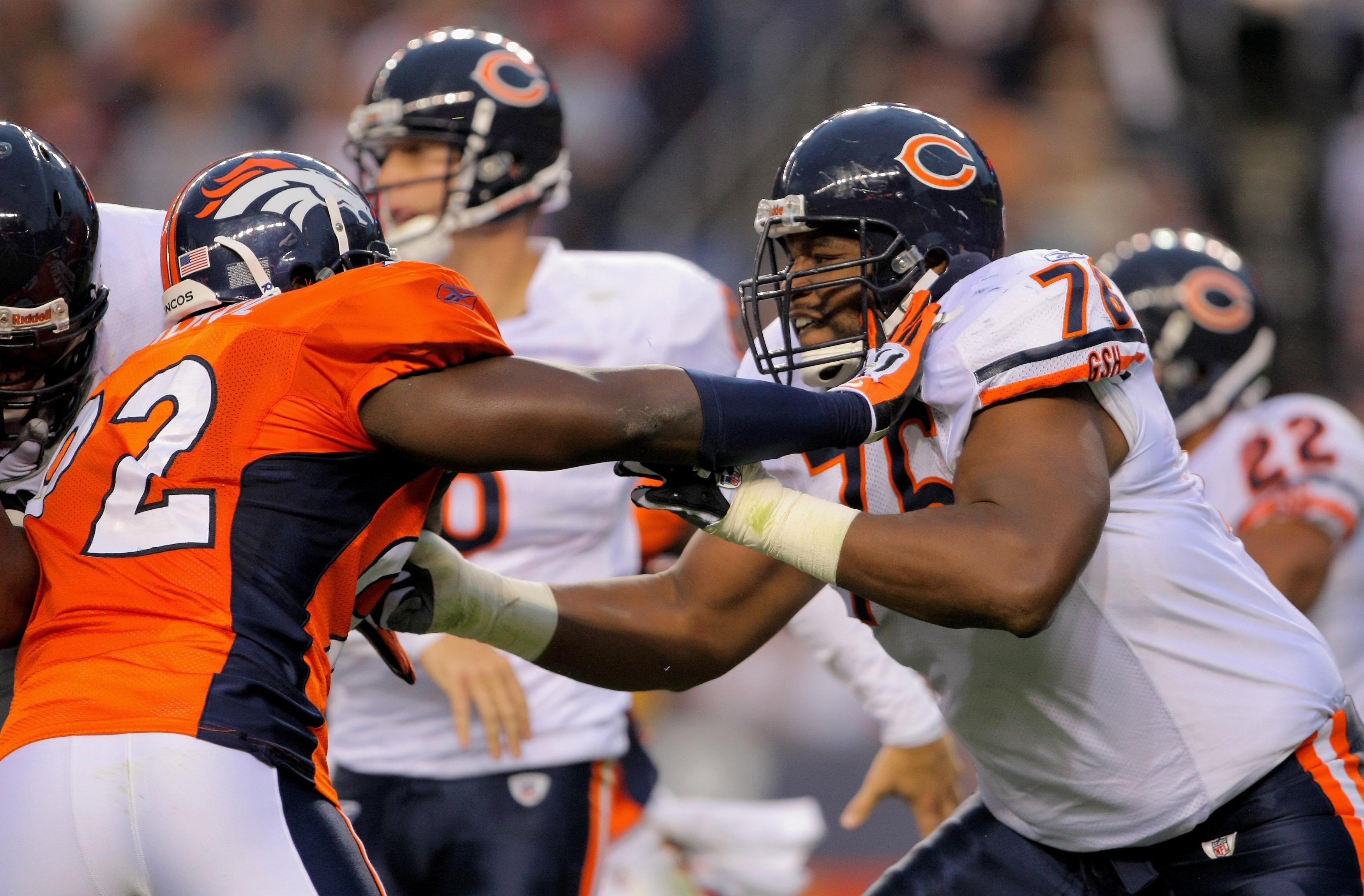 DENVER - AUGUST 30:  Offensive tackle Orlando Pace #76 of the Chicago Bears blocks against the rush of Elvis Dumervil #92 of the Denver Broncos during preseason NFL action at INVESCO Field at Mile High on August 30, 2009 in Denver, Colorado. The Bears def
