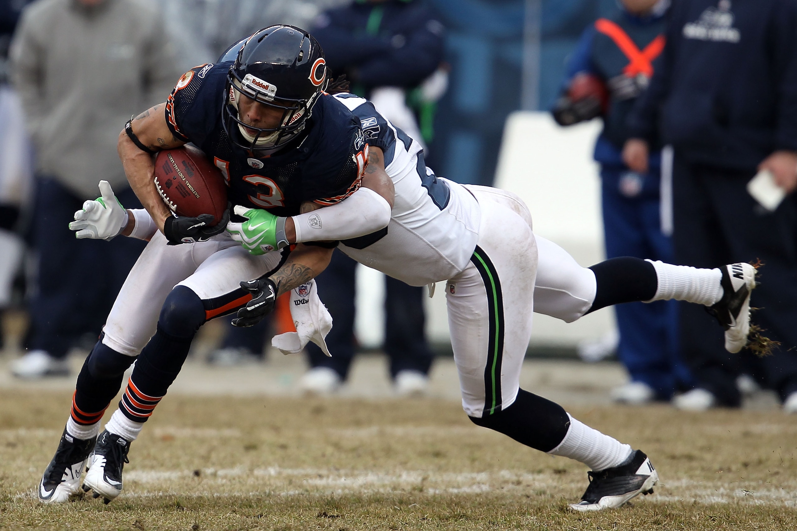 CHICAGO, IL - JANUARY 16:  Johnny Knox #13 of the Chicago Bears runs after a catch against the Seattle Seahawks in the 2011 NFC divisional playoff game at Soldier Field on January 16, 2011 in Chicago, Illinois.  (Photo by Jonathan Daniel/Getty Images)