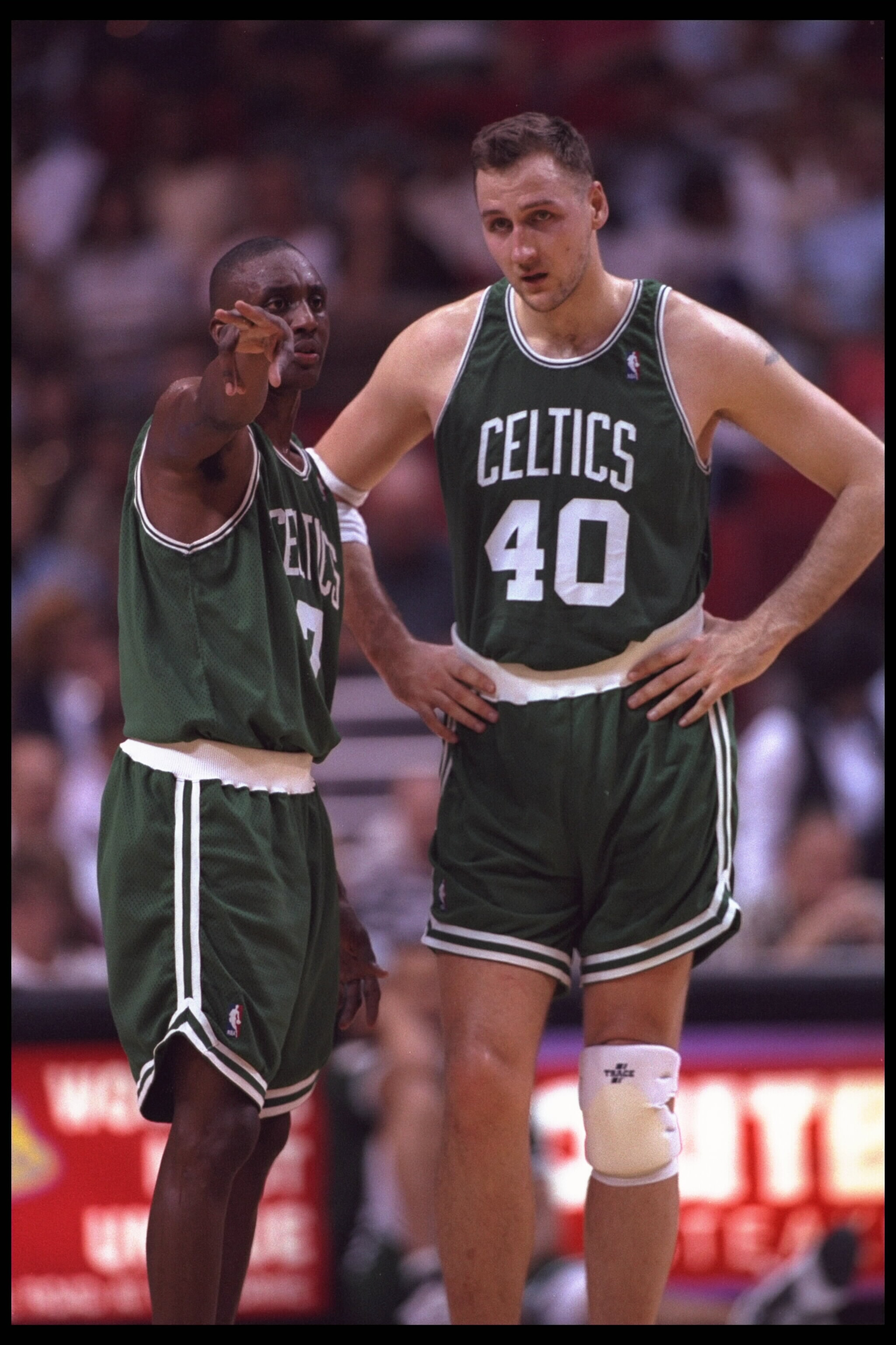 31 Jan 1996: Forward Dino Radja #40 of the Boston Celtics and Dee Brown #7 converse on the court during the game against the Orlando Magic at the Orlando Arena in Orlando, Florida. The Magic defeated the Celtics 104-99. Mandatory Credit: Allsport USA/A 31 Jan 1996: Forward Dino Radja #40 of the Boston Celtics and Dee Brown #7 converse on the court during the game against the Orlando Magic at the Orlando Arena in Orlando, Florida. The Magic defeated the Celtics 104-99. Mandatory Credit: Allsport USA/A