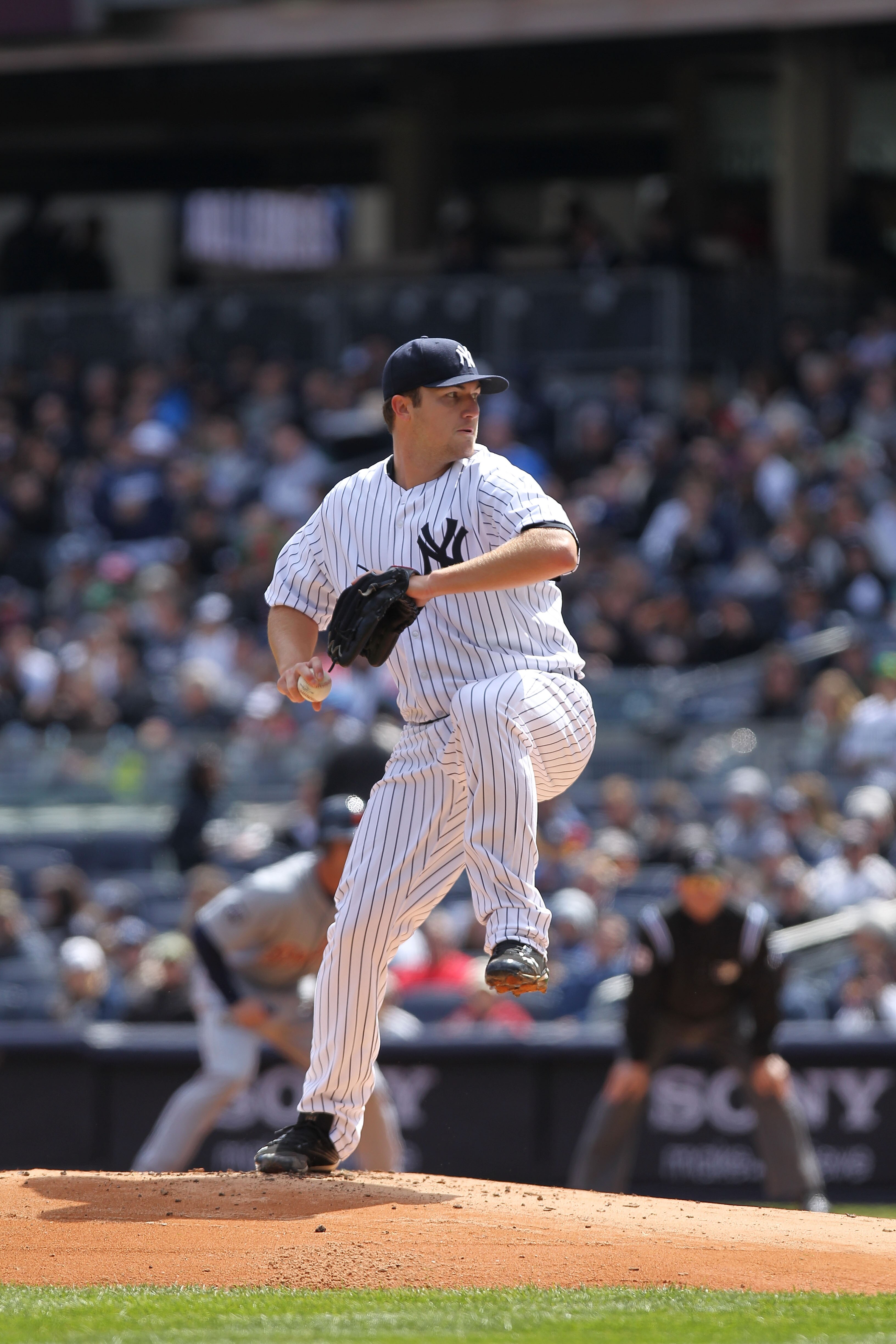 NEW YORK, NY - APRIL 03:  Phil Hughes #65 of the New York Yankees pitches against the Detroit Tigers at Yankee Stadium on April 3, 2011 in the Bronx borough of New York City.  (Photo by Nick Laham/Getty Images)