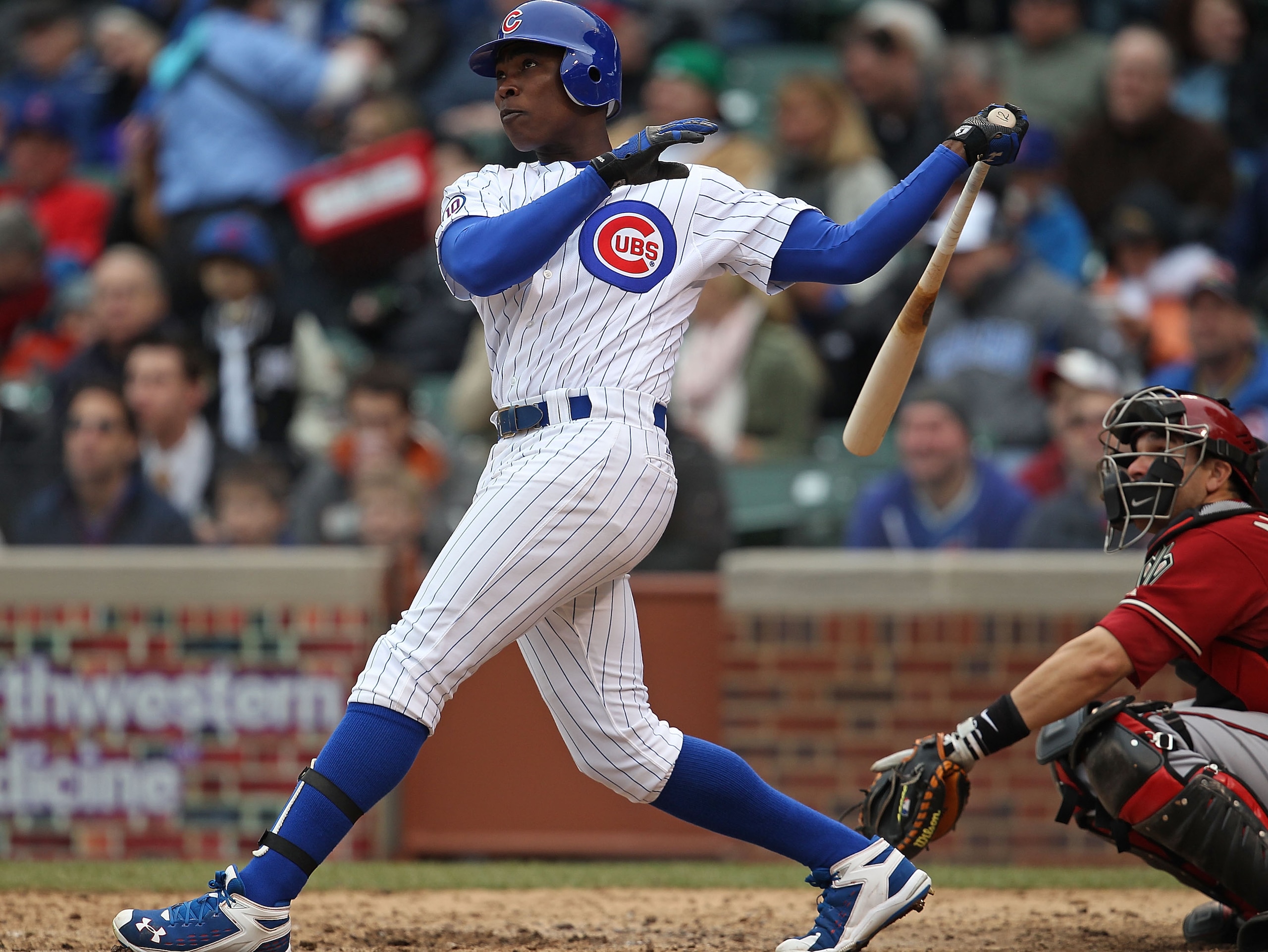 CHICAGO, IL - APRIL 06: Alfonso Soriano #12 of the Chicago Cubs hits his third home run of the season in the 7th inning against the Arizona Diamondbacks at Wrigley Field on April 6, 2011 in Chicago, Illinois. The Diamondbacks defeated the Cubs 6-4. (Photo