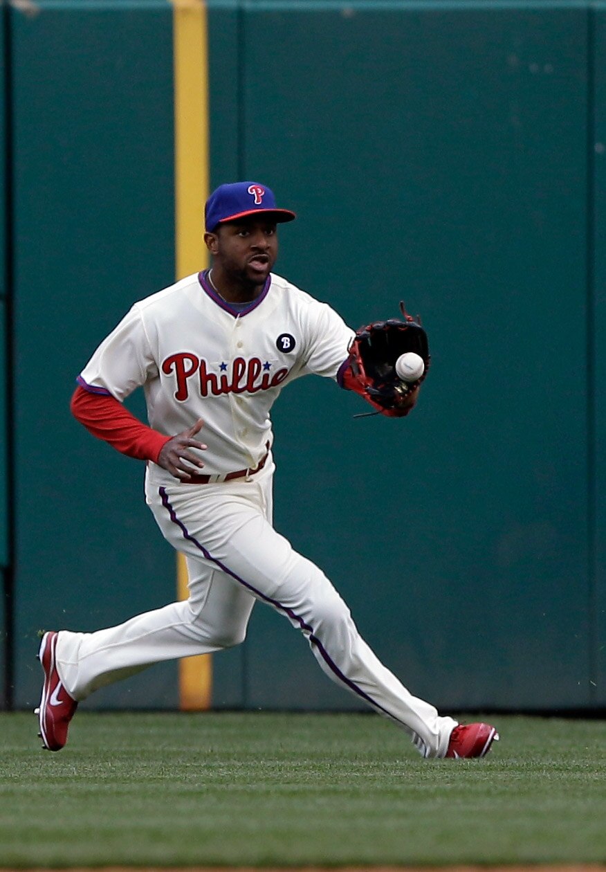 PHILADELPHIA, PA - APRIL 01: Right fielder Ben Francisco #10 of the Philadelphia Phillies makes a play against the Houston Astros during opening day at Citizens Bank Park on April 1, 2011 in Philadelphia, Pennsylvania.  (Photo by Rob Carr/Getty Images)