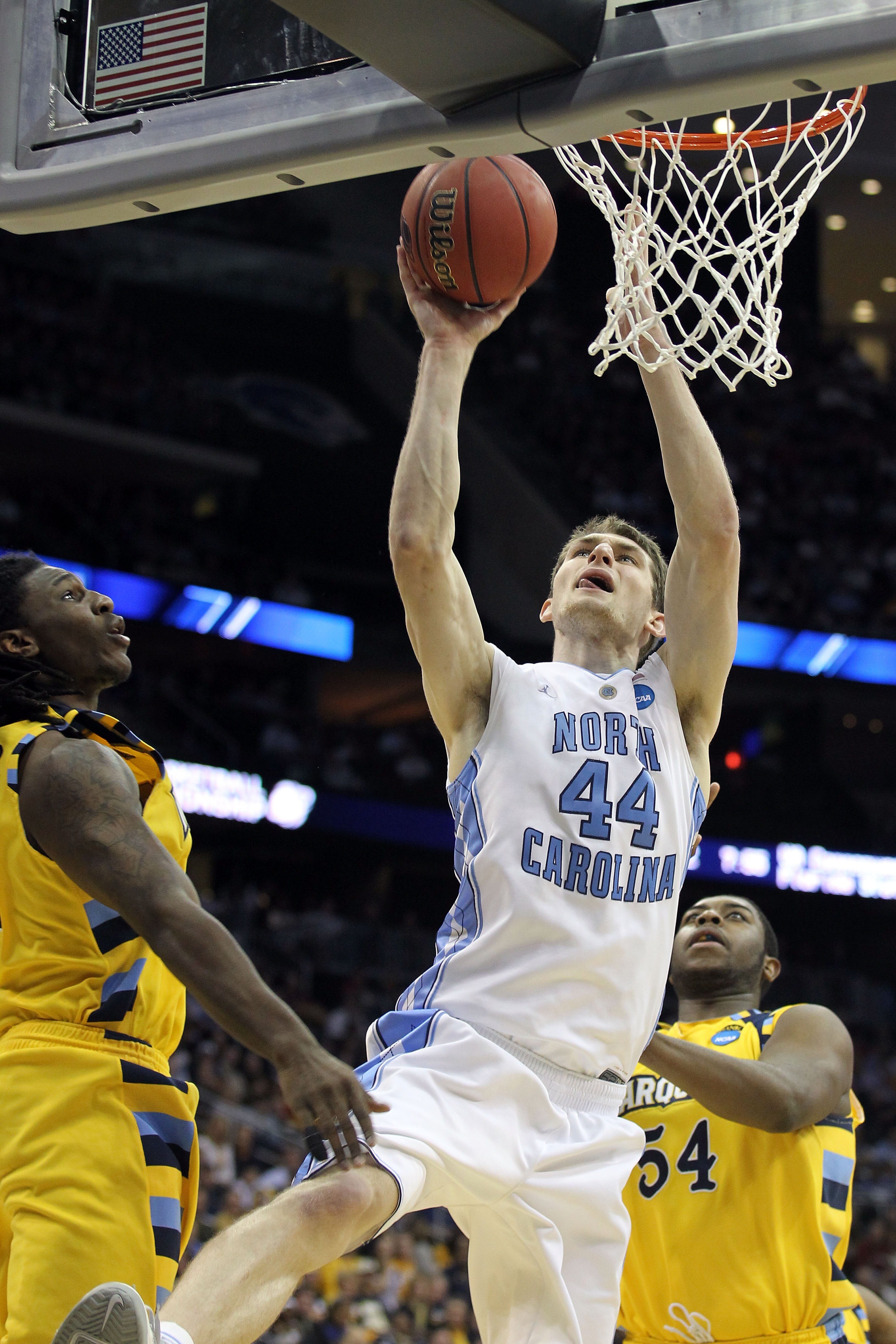 NEWARK, NJ - MARCH 25:  Tyler Zeller #44 of the North Carolina Tar Heels in action against the Marquette Golden Eagles during the east regional semifinal of the 2011 NCAA Men's Basketball Tournament at the Prudential Center on March 25, 2011 in Newark, Ne