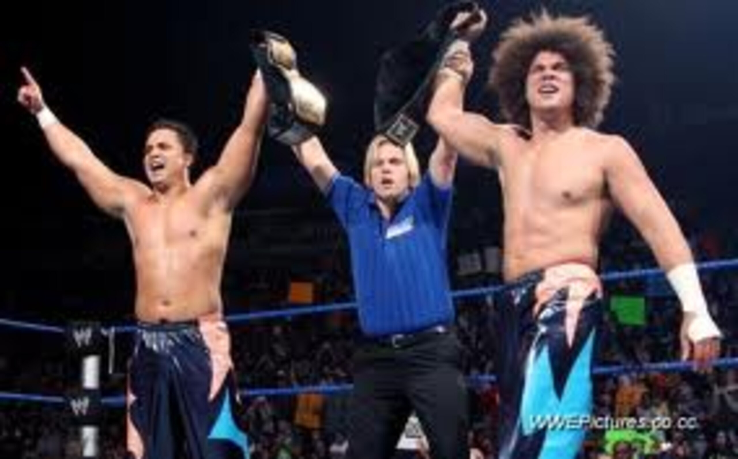 Primo and Carlito as WWE Tag Team Champions