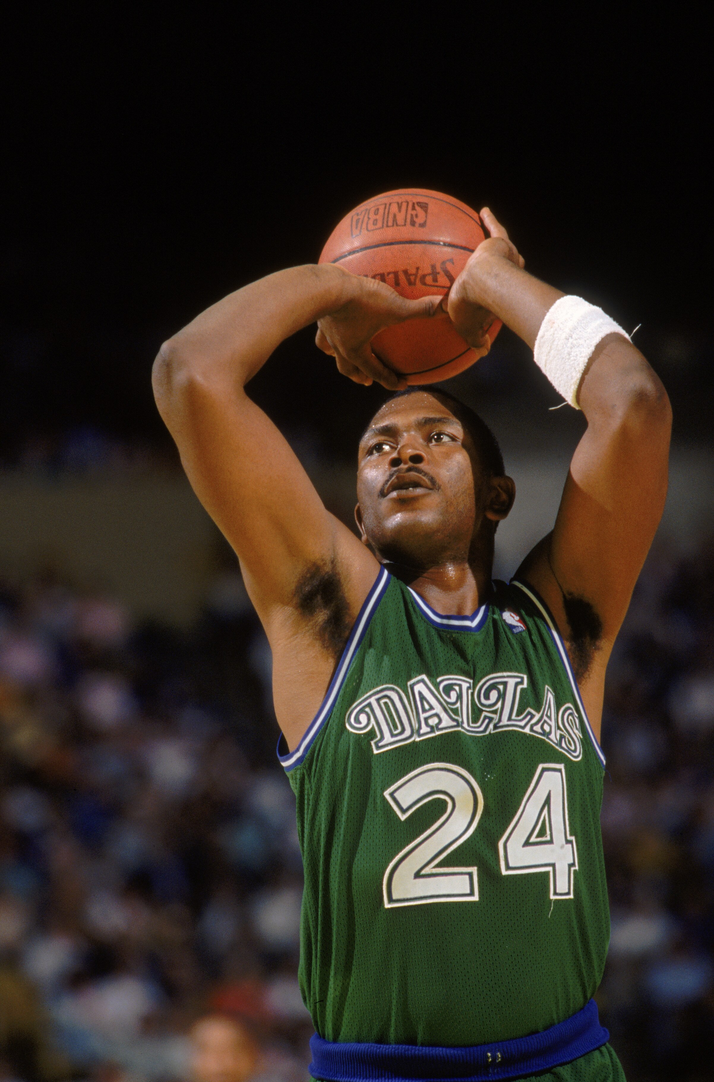 LOS ANGELES - 1987:  Mark Aguirre #24 of the Dallas Mavericks shoots a free throw during the NBA game against the Los Angeles Lakers at the Great Western Forum in Los Angeles, California in 1987. (Photo by Mike Powell/Getty Images)