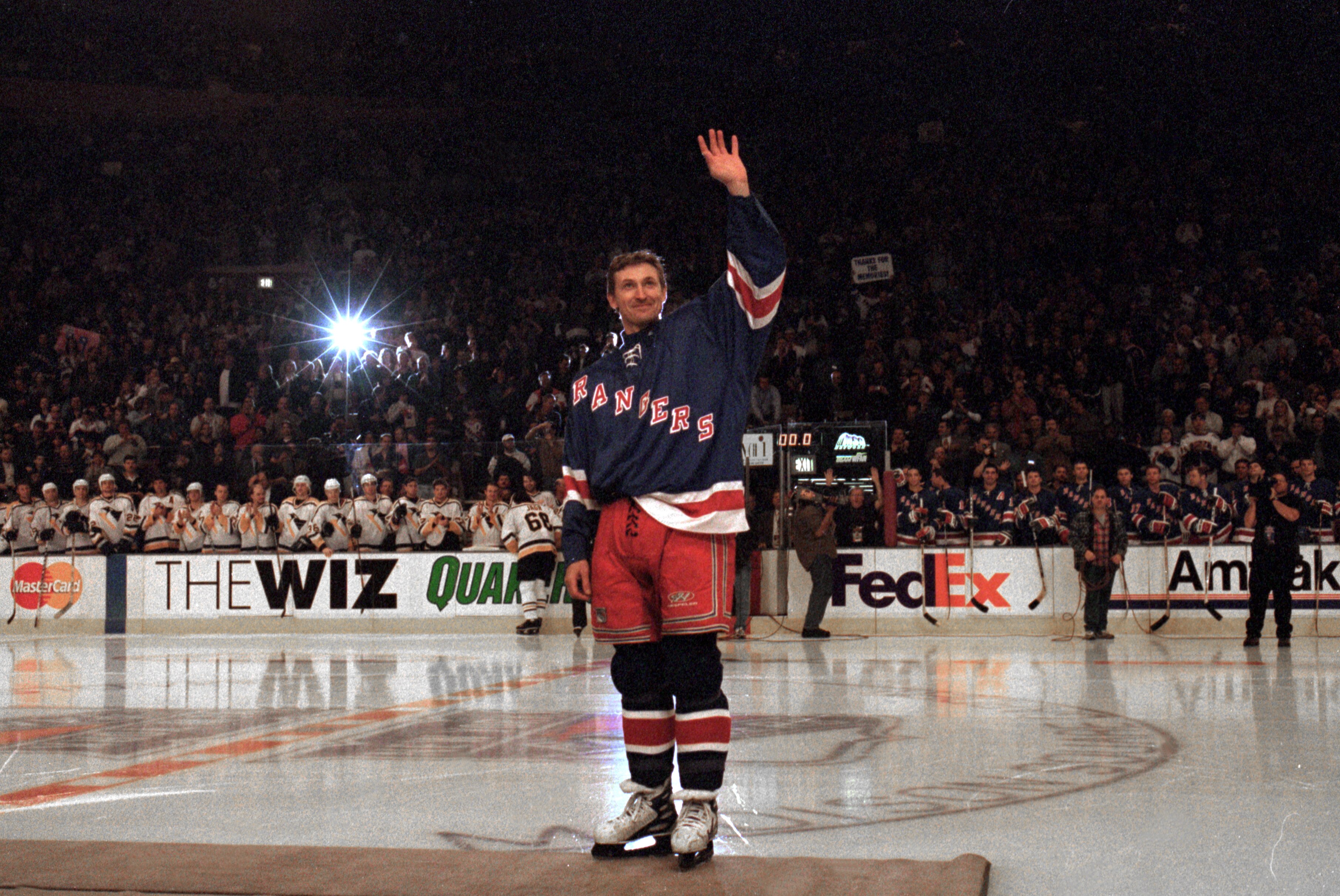 NEW YORK, NY - APRIL 18:  Wayne Gretzky #99 of the New York Rangers acknowledges the crowd during introductions before playing in his final career game against the Pittsburgh Penguins at the Madison Square Garden on April 18, 1999 in New York City, New Yo