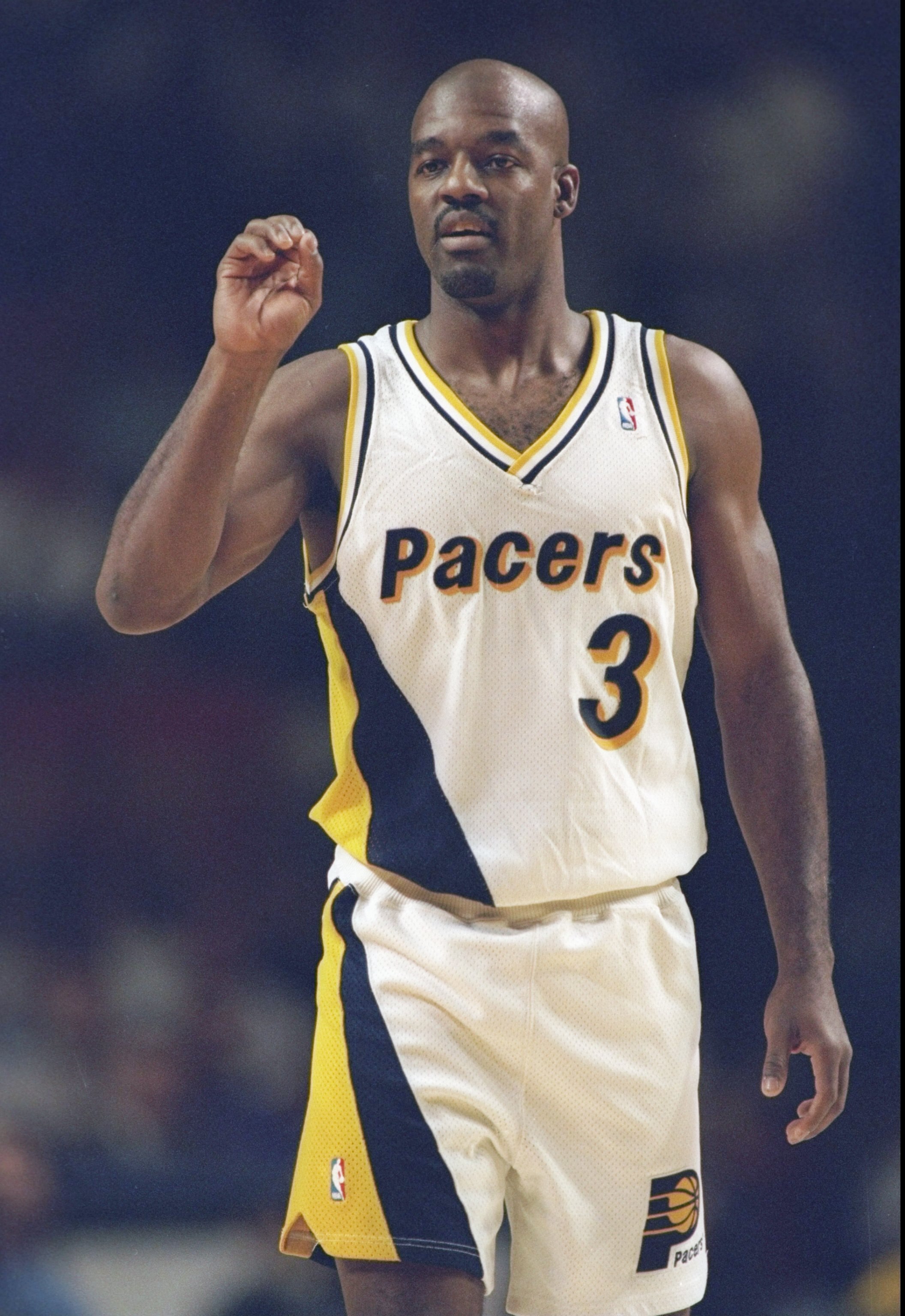 9 Nov 1994: Guard Haywoode Workman of the Indiana Pacers gives a hand signal during a game against the Houston Rockets at Market Square Arena in Indianapolis, Indiana. The Rockets won the game 109-104.