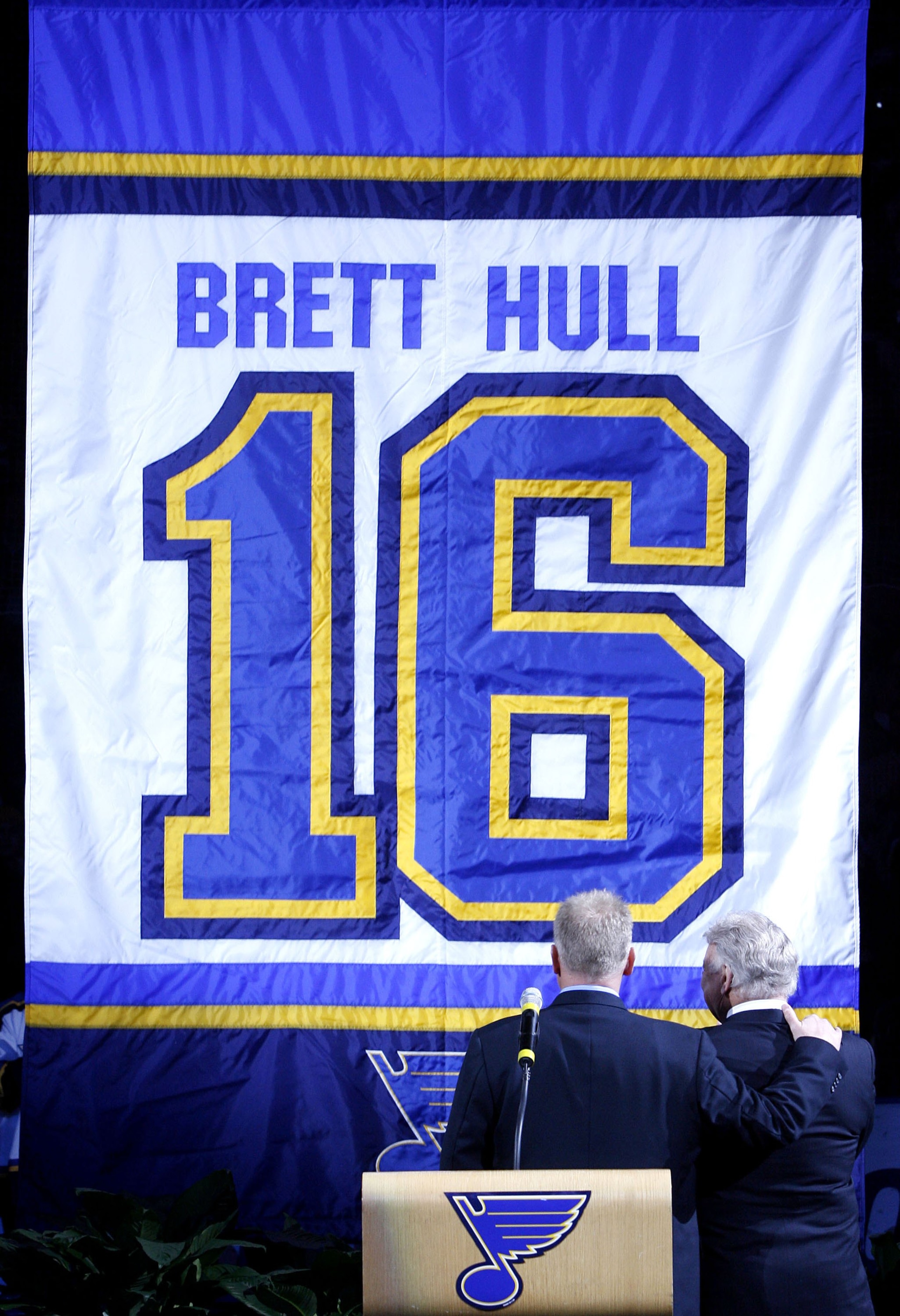 ST. LOUIS, MO - DECEMBER 5:  Former St. Louis Blues player Brett Hull and his father Bobby watch Brett's jersey number being raised to the rafters during his jersey retirement ceremony at the Scottrade Center December 5, 2006 in St. Louis, Missouri.  (Pho