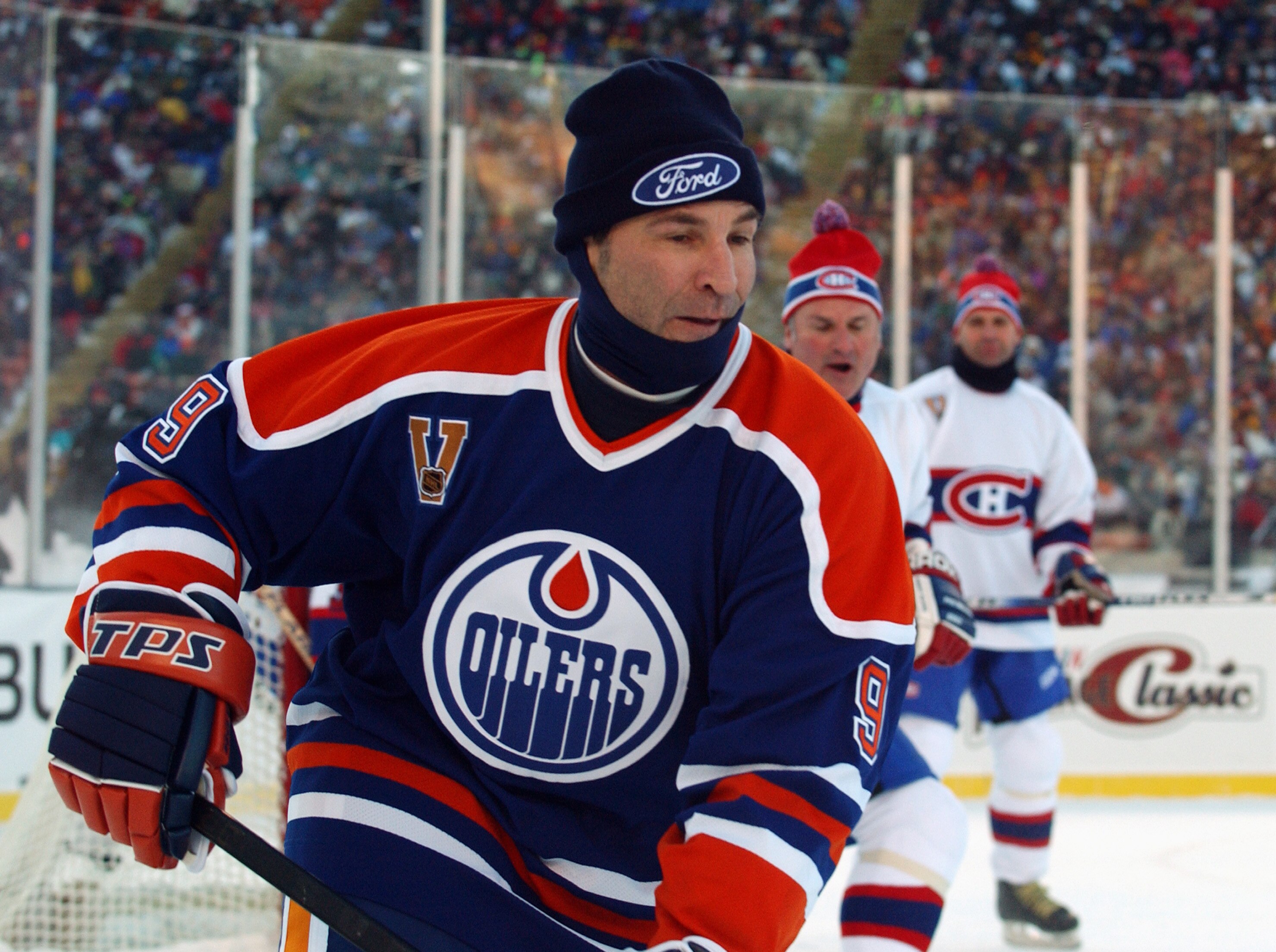 EDMONTON, CANADA - NOVEMBER 22:  Glenn Anderson #9 of the Edmonton Oilers skates after the play during the Molson Canadien Heritage Classic against the Montreal Canadiens on November 22, 2003 at Commonwealth Stadium in Edmonton, Canada. The Oilers defeate