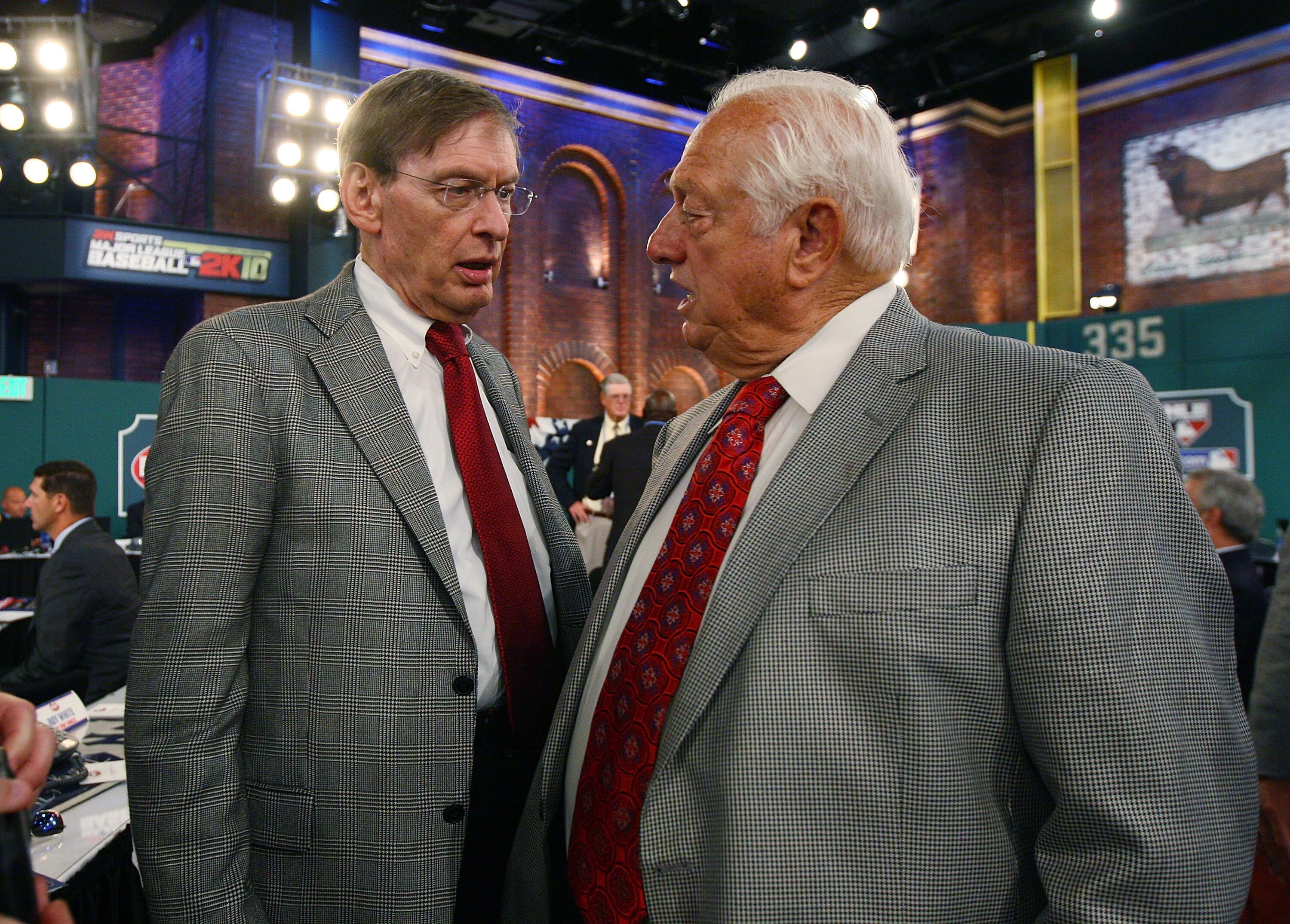 SECAUCUS, NJ - JUNE 07:  Team representative Tommy Losorda of the Los Angeles Dodgers and MLB Commissioner Bud Selig speak during the MLB First Year Player Draft on June 7, 2010 held in Studio 42 at the MLB Network in Secaucus, New Jersey. (Photo by Mike
