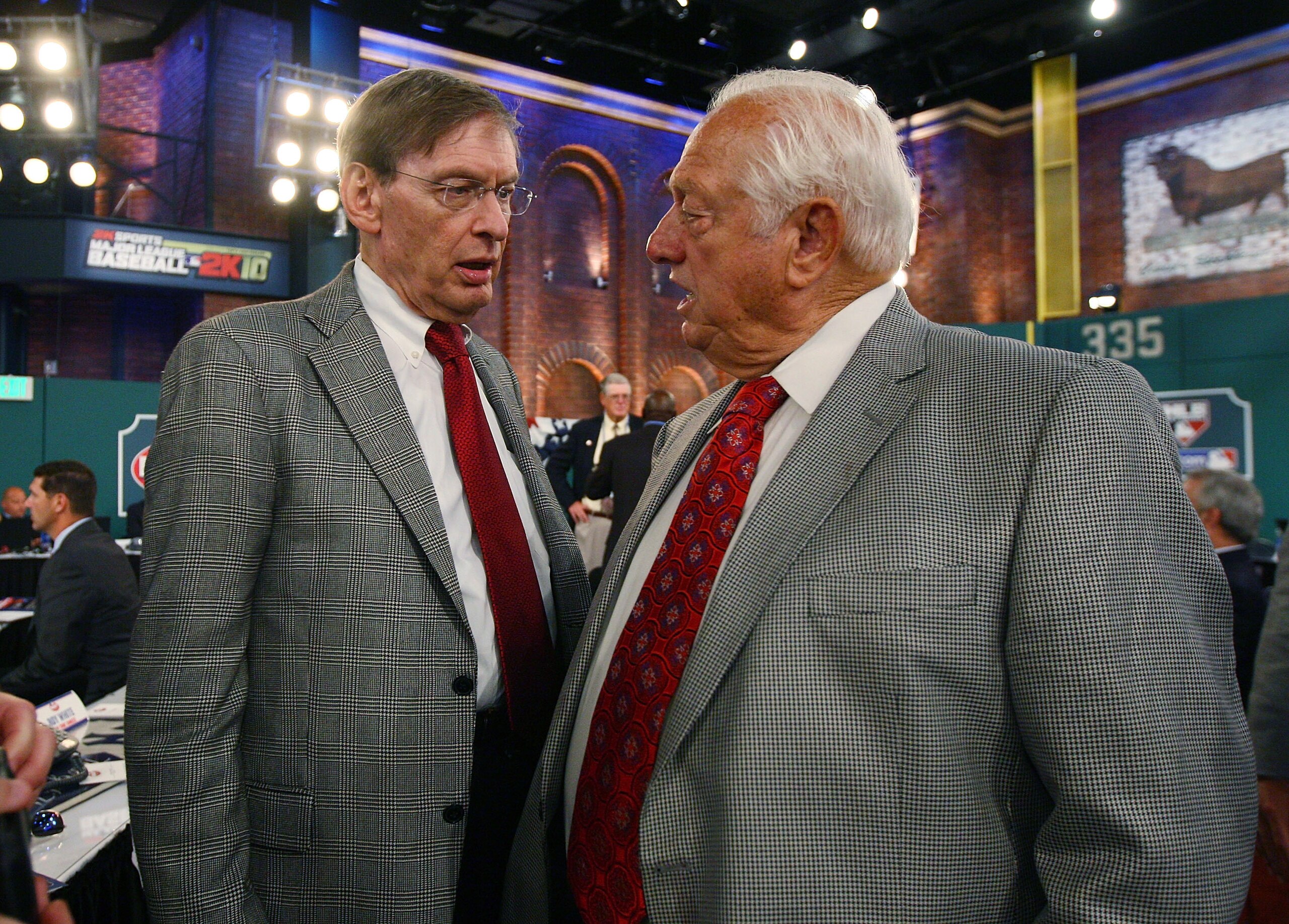 SECAUCUS, NJ - JUNE 07:  Team representative Tommy Losorda of the Los Angeles Dodgers and MLB Commissioner Bud Selig speak during the MLB First Year Player Draft on June 7, 2010 held in Studio 42 at the MLB Network in Secaucus, New Jersey. (Photo by Mike