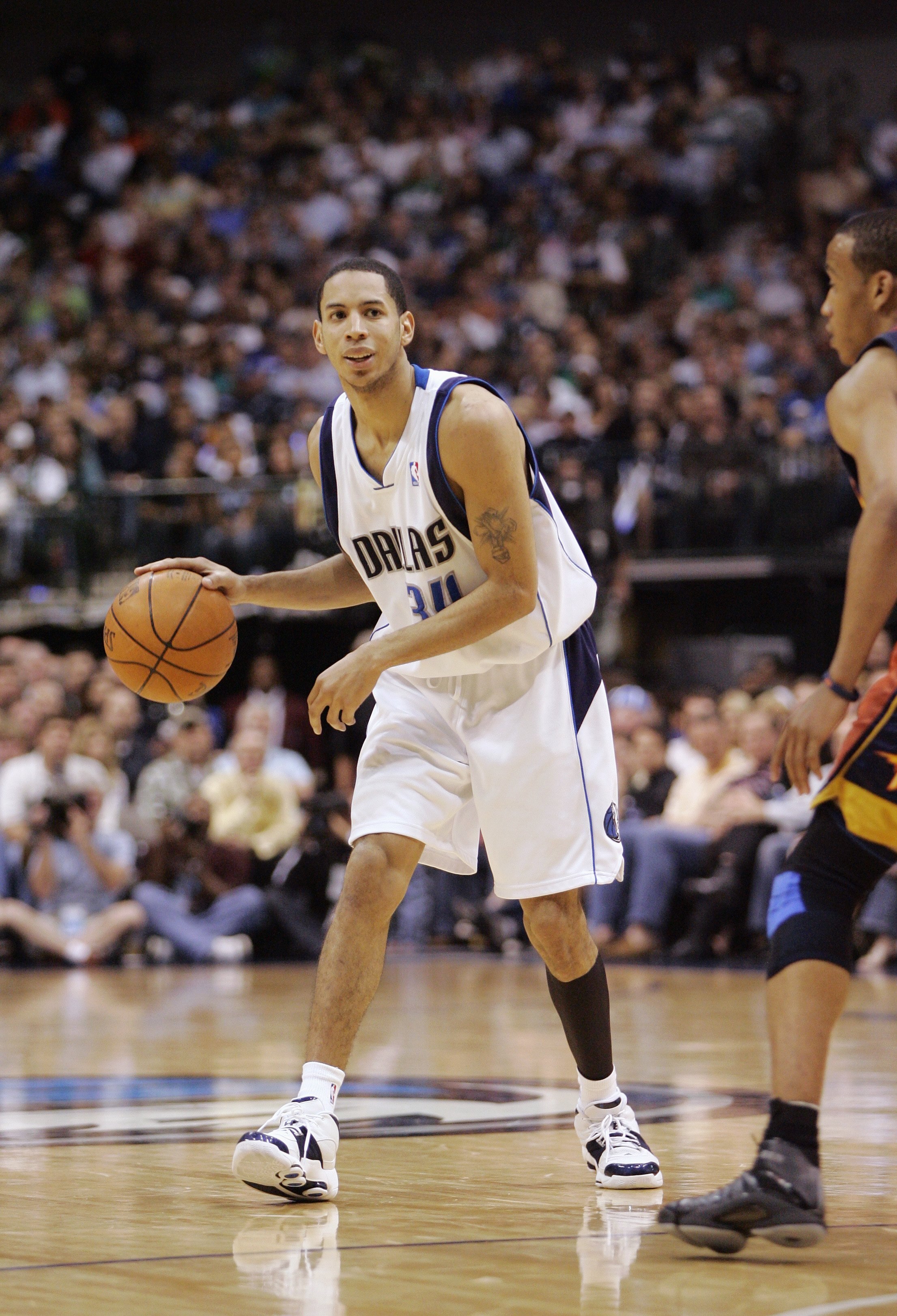 DALLAS - APRIL 21:  Devin Harris #34 of the Dallas Mavericks handles the ball in Game One of the Western Conference Quarterfinals against the Golden State Warriors during the 2007 NBA Playoffs at American Airlines Center on April 21, 2007 in Dallas, Texas