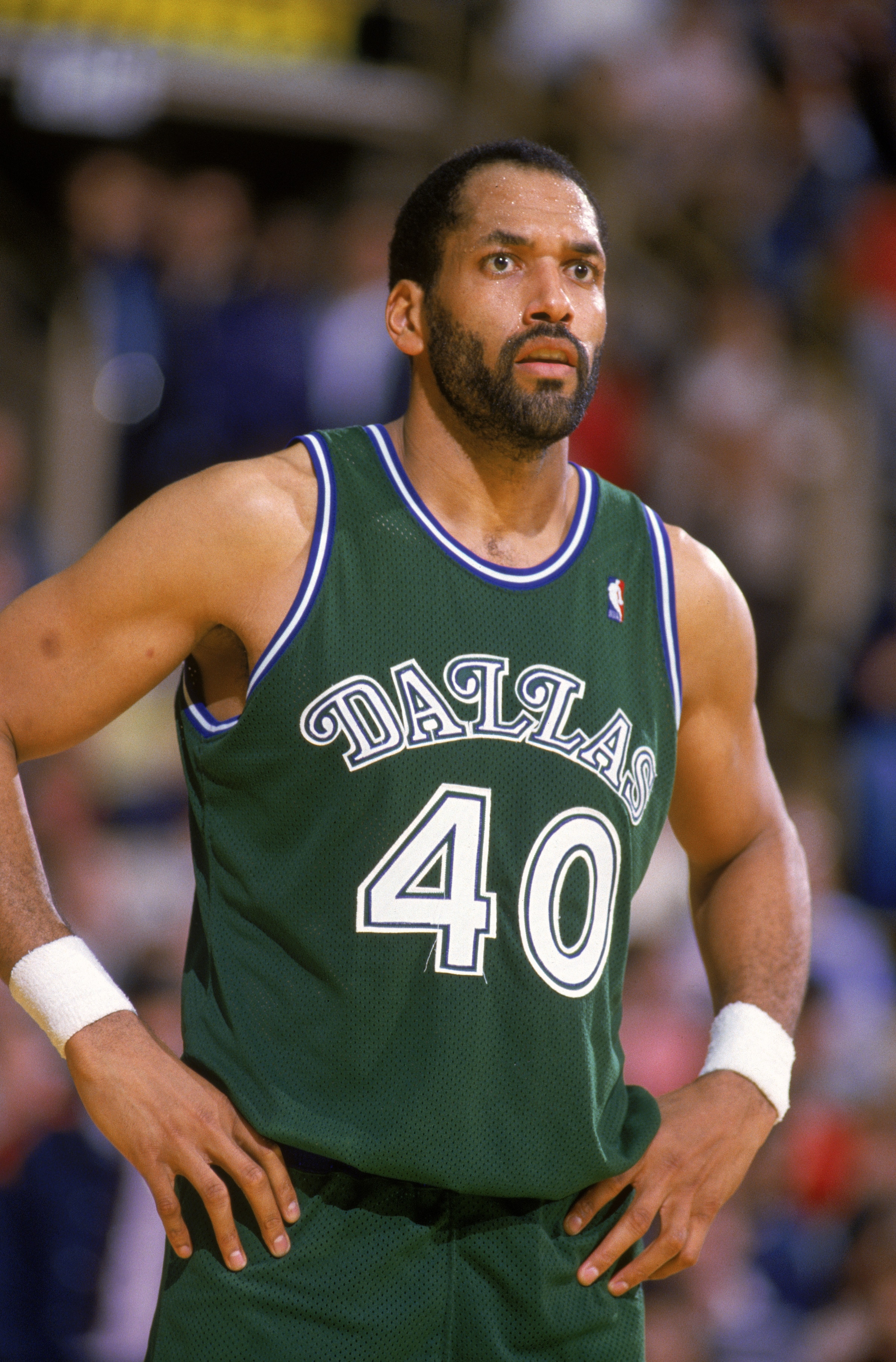 LOS ANGELES - 1987:  James Donaldson #40 of the Dallas Mavericks stands on the court during the NBA game against the Los Angeles Lakers at the Great Western Forum in Los Angeles, California in 1987.  (Photo by Stephen Dunn/Getty Images)