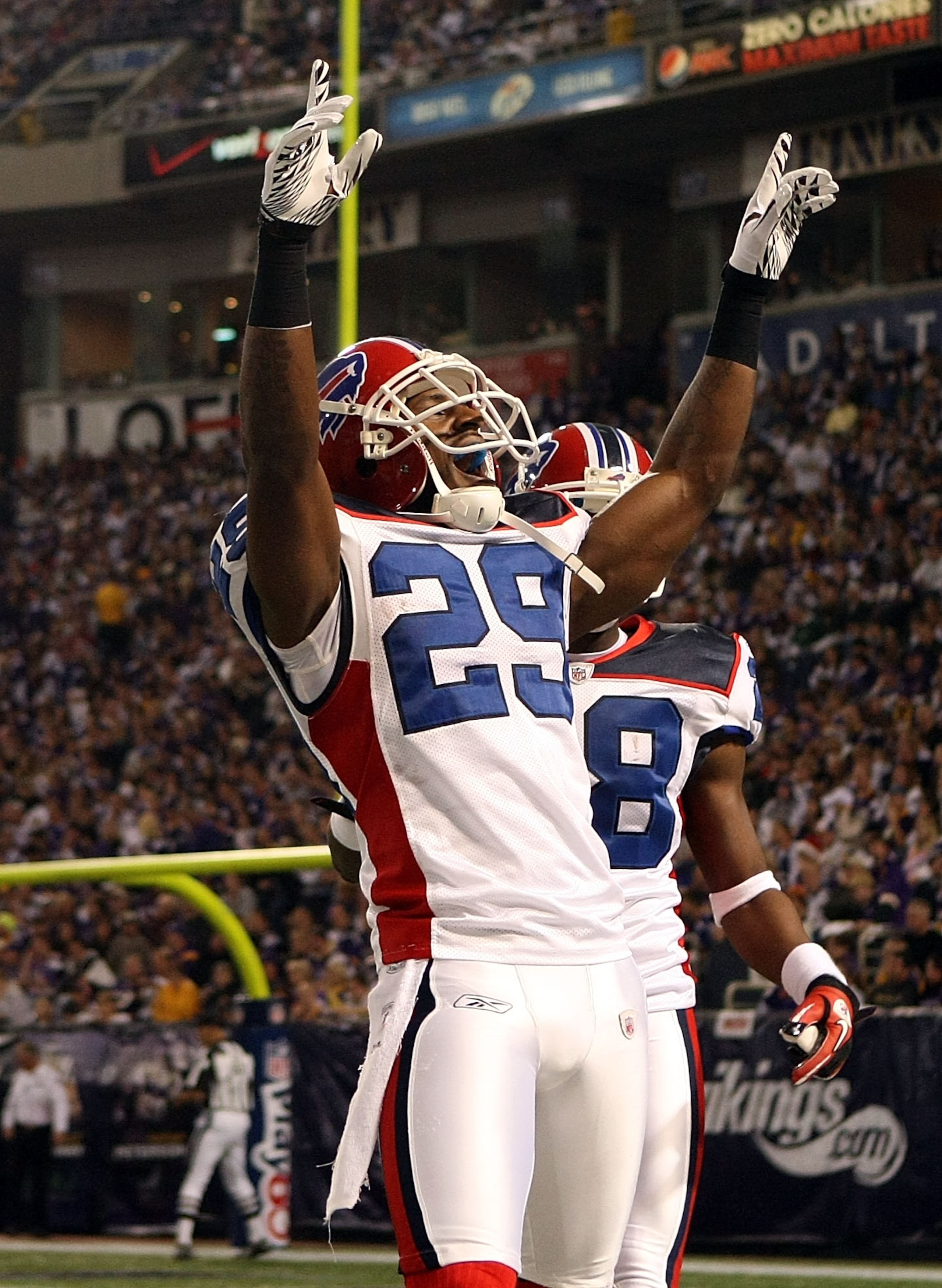 MINNEAPOLIS, MN - DECEMBER 05:  Drayton Florence #29 of the Buffalo Bills celebrates a touchdown after he intercepted a pass by Tarvaris Jackson #7 of the Minnesota Vikings at the Mall of America Field at the Hubert H. Humphrey Metrodome on December 5, 20