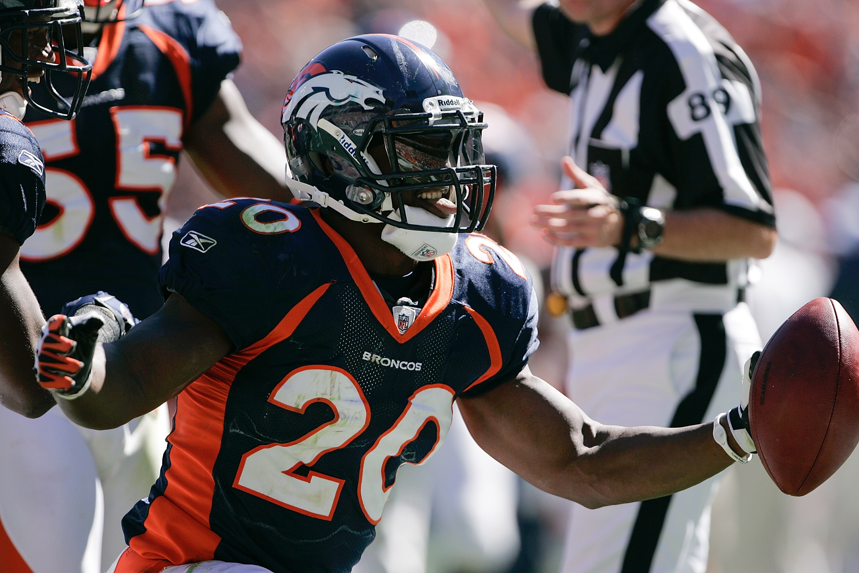 DENVER - SEPTEMBER 19:  Safety Brian Dawkins #20 of the Denver Broncos celebrates his interception in the first half against the Seattle Seahawks at INVESCO Field at Mile High on September 19, 2010 in Denver, Colorado.  (Photo by Justin Edmonds/Getty Imag