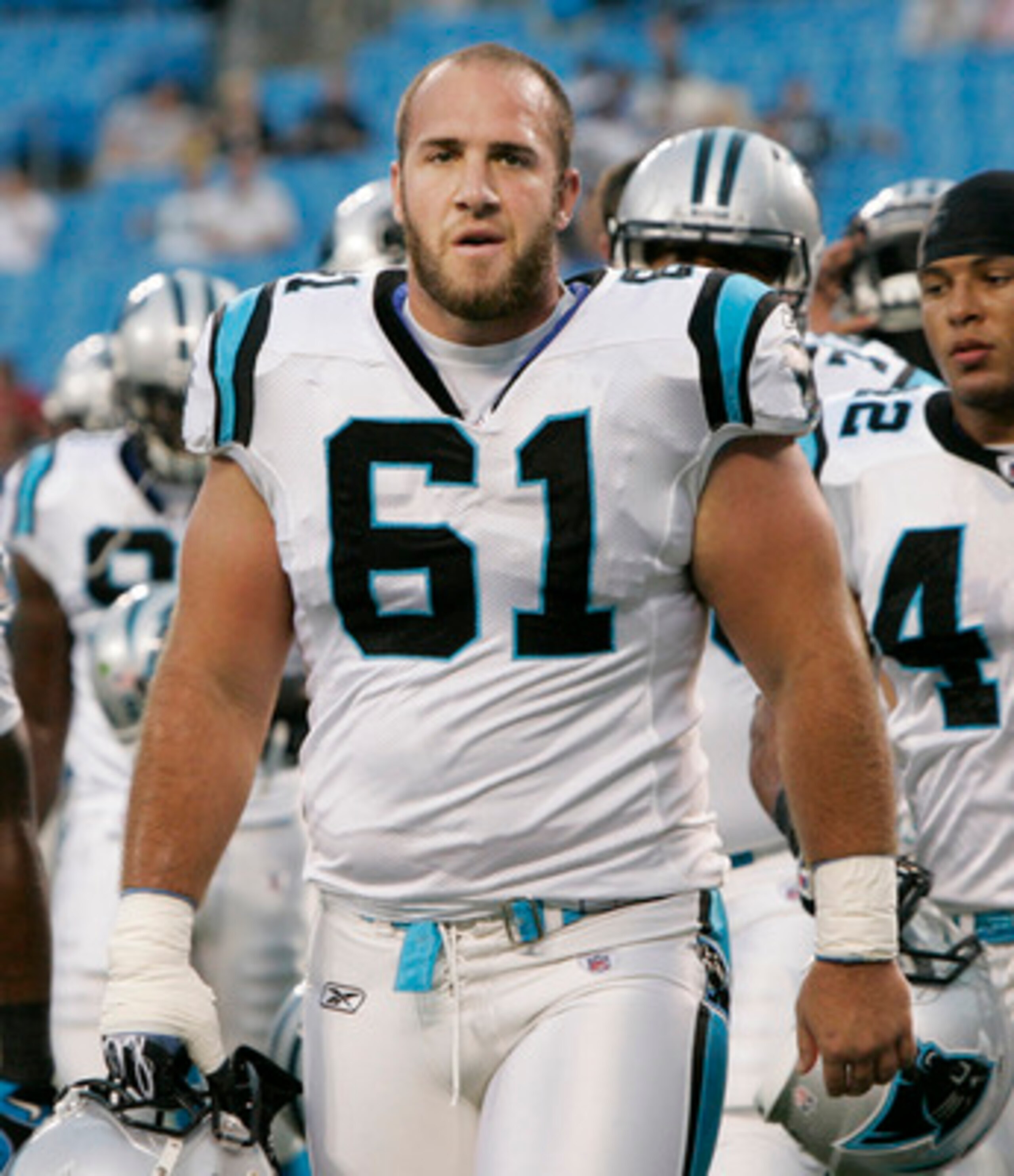 CHARLOTTE, NC - AUGUST 21: Defensive Tackle Derek Landri #61 of the Carolina Panthers walks off the field with his team before the start of their preseason game against the New York Jets at Bank of America Stadium on August 21, 2010 in Charlotte, North C CHARLOTTE, NC - AUGUST 21: Defensive Tackle Derek Landri #61 of the Carolina Panthers walks off the field with his team before the start of their preseason game against the New York Jets at Bank of America Stadium on August 21, 2010 in Charlotte, North C