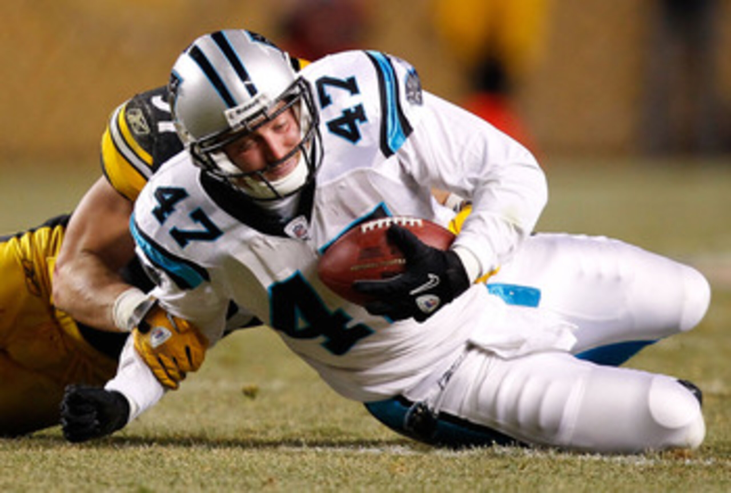 PITTSBURGH - DECEMBER 23: Jeff King #47 of the Carolina Panthers is tackled after catching a pass during the game against the Pittsburgh Steelers on December 23, 2010 at Heinz Field in Pittsburgh, Pennsylvania. (Photo by Jared Wickerham/Getty Images) PITTSBURGH - DECEMBER 23: Jeff King #47 of the Carolina Panthers is tackled after catching a pass during the game against the Pittsburgh Steelers on December 23, 2010 at Heinz Field in Pittsburgh, Pennsylvania. (Photo by Jared Wickerham/Getty Images)