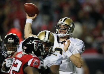 ATLANTA, GA - DECEMBER 27:  Quarterback Drew Brees #9 of the New Orleans Saints looks upfield to pass in the first half during the game against the Atlanta Falcons at the Georgia Dome on December 27, 2010 in Atlanta, Georgia.  (Photo by Kevin C. Cox/Getty