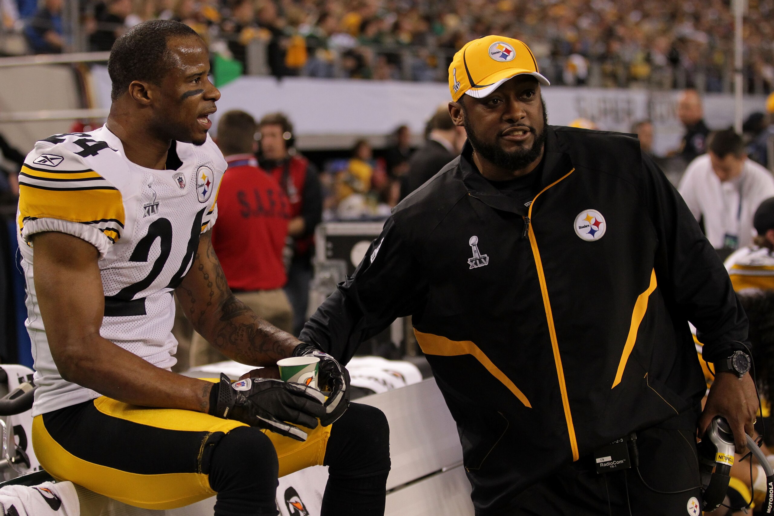 ARLINGTON, TX - FEBRUARY 06:  Ike Taylor #24 of the Pittsburgh Steelers talks with head coach Mike Tomlin of the Pittsburgh Steelers during Super Bowl XLV against the Green Bay Packers at Cowboys Stadium on February 6, 2011 in Arlington, Texas.  (Photo by