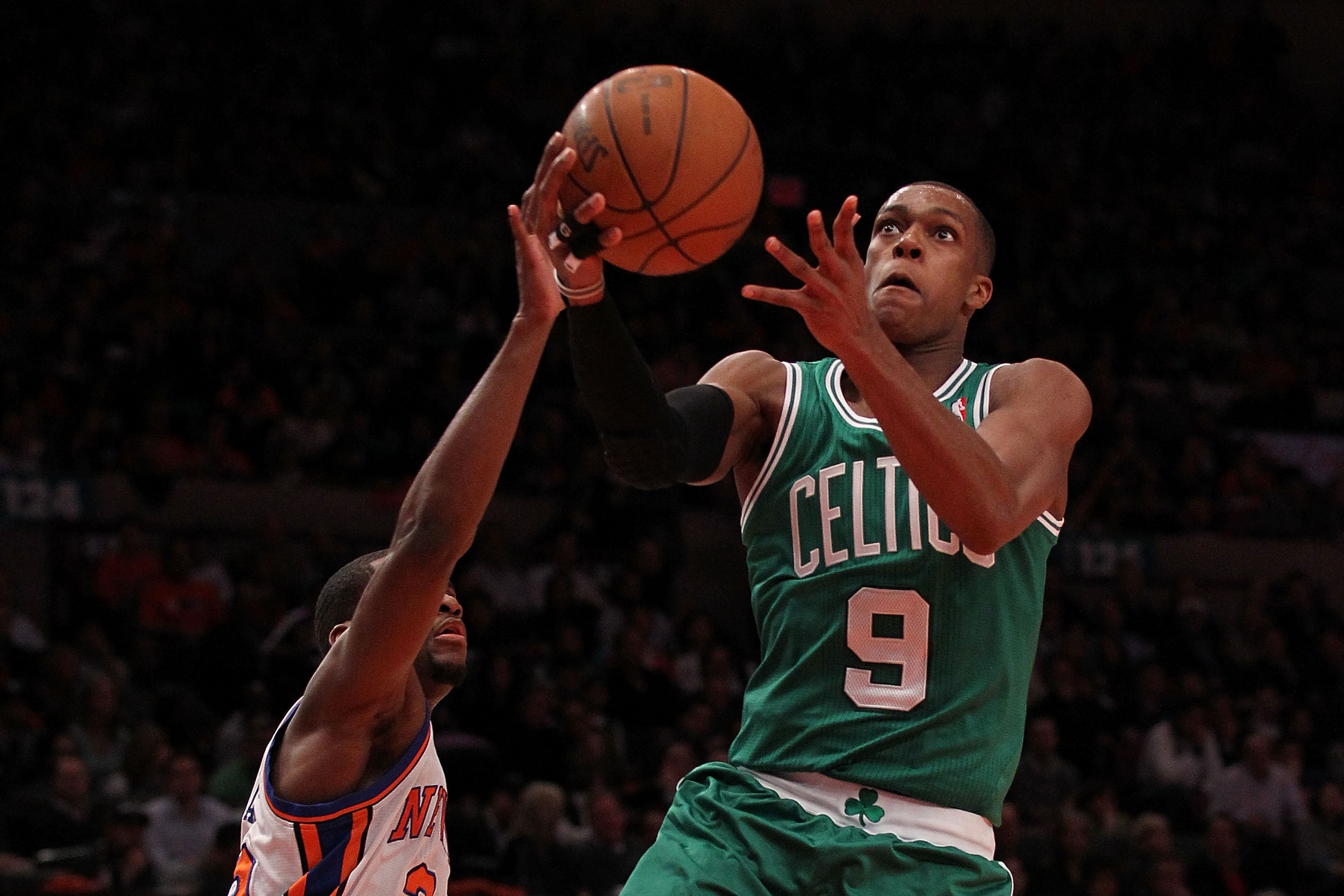 NEW YORK, NY - APRIL 22:  Rajon Rondo #9 of the Boston Celtics drives for a shot attempt against Toney Douglas #23 of the New York Knicks in Game Three of the Eastern Conference Quarterfinals in the 2011 NBA Playoffs on April 22, 2011 at Madison Square Ga