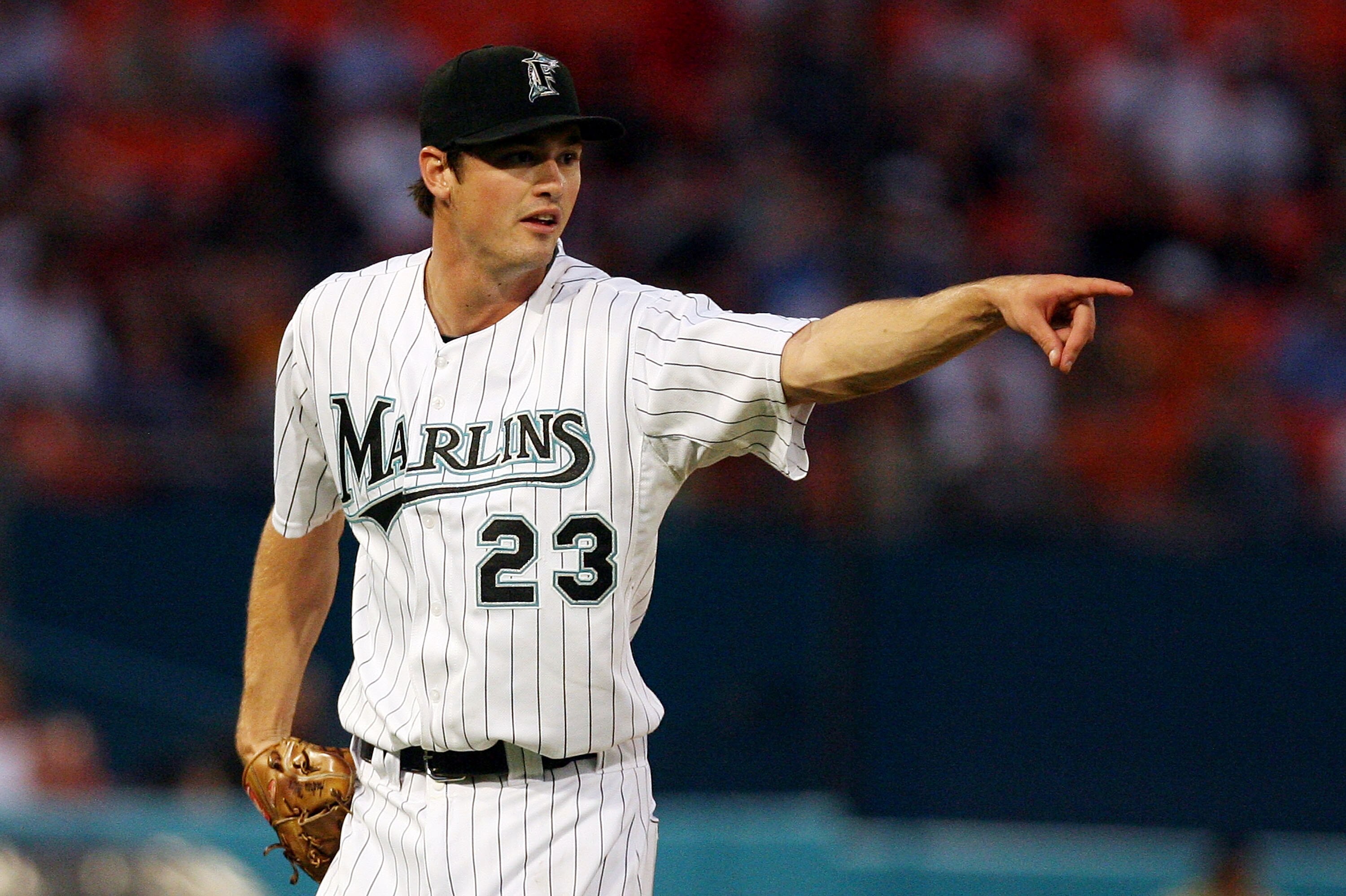 MIAMI - APRIL 02:  Starting pitcher Andrew Miller #23 of the Florida Marlins points to first base umpire Chad Fairchild to appeal for a strike call against the New York Mets at Dolphin Stadium on April 2, 2008 in Miami, Florida.  (Photo by Doug Benc/Getty
