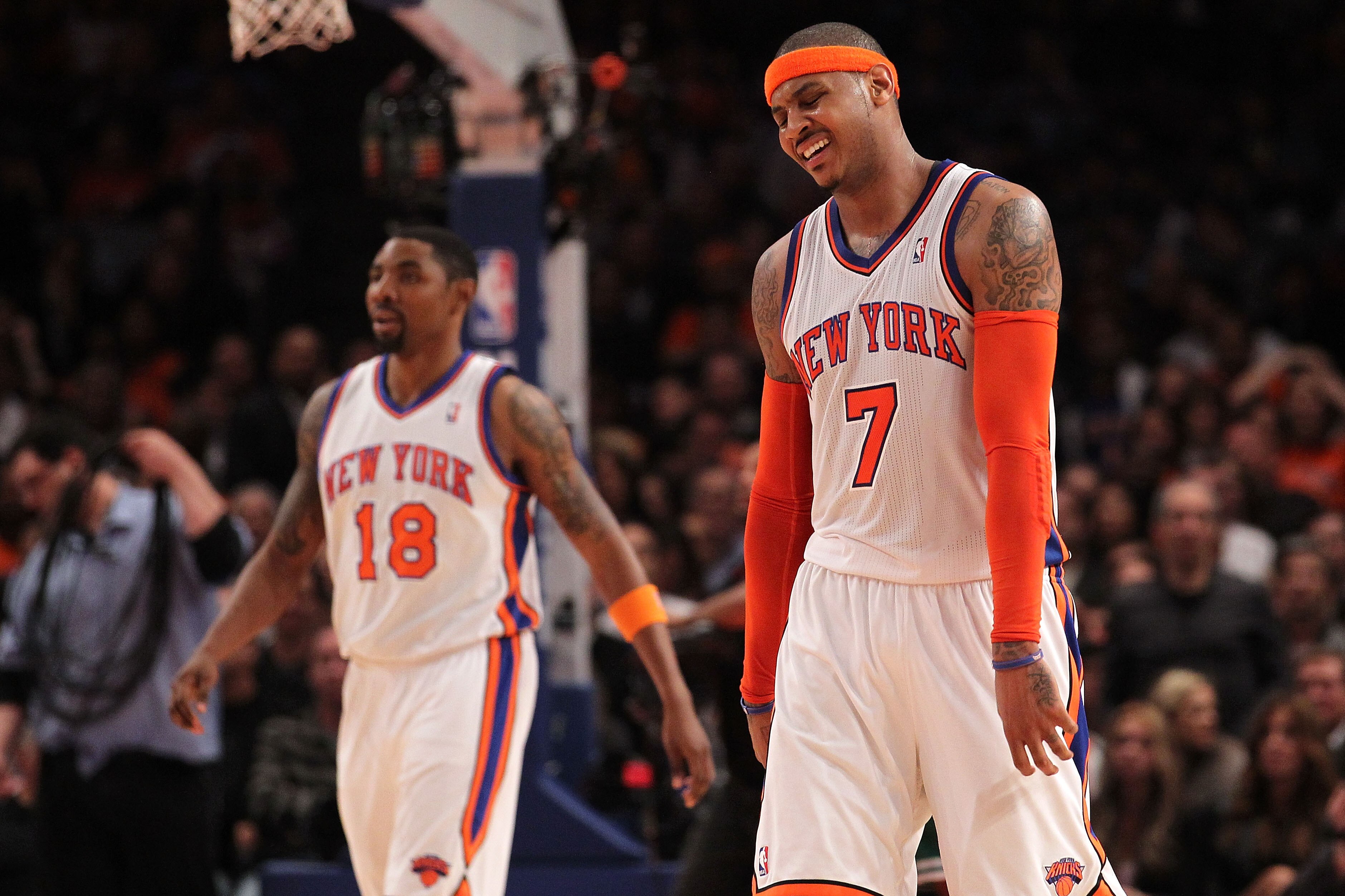 NEW YORK, NY - APRIL 22:  (L-R) Roger Mason #18 and Carmelo Anthony #7 of the New York Knicks react against the Boston Celtics in Game Three of the Eastern Conference Quarterfinals in the 2011 NBA Playoffs on April 22, 2011 at Madison Square Garden in New