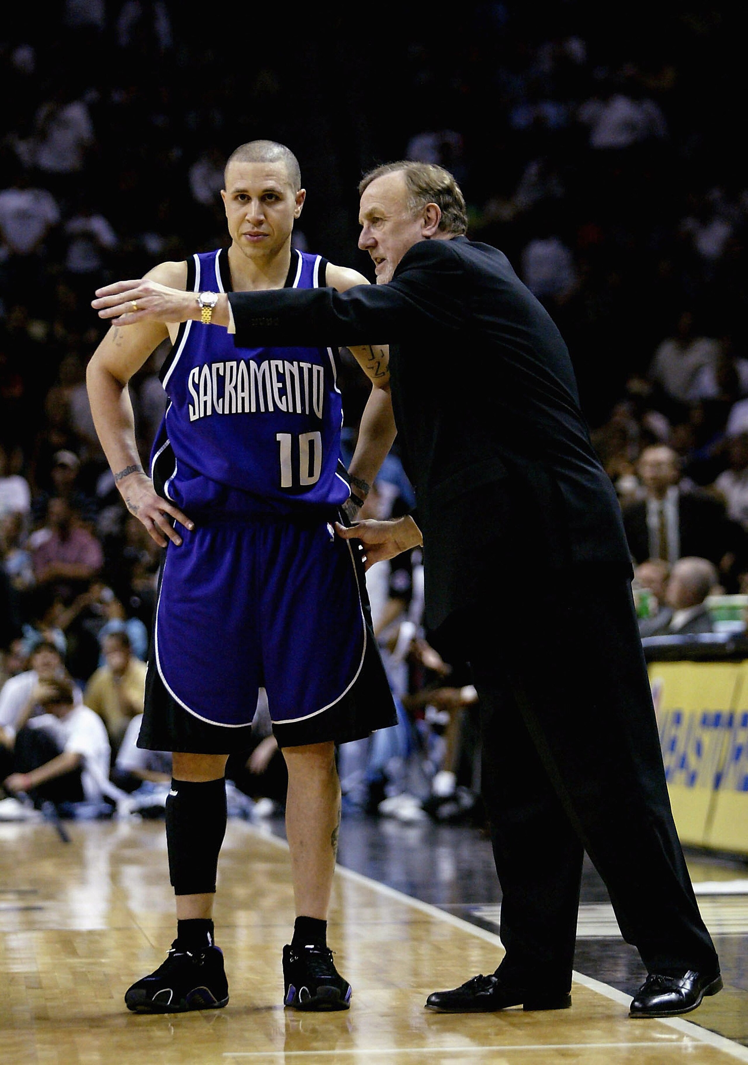 SAN ANTONIO, TX - APRIL 25: Head coach Rick Adelman of the Sacramento Kings talks things over with Mike Bibby #10 in the game with the San Antonio Spurs in game two of the Western Conference Quarterfinals during the 2006 NBA Playoffs on April 25, 2006 at SAN ANTONIO, TX - APRIL 25: Head coach Rick Adelman of the Sacramento Kings talks things over with Mike Bibby #10 in the game with the San Antonio Spurs in game two of the Western Conference Quarterfinals during the 2006 NBA Playoffs on April 25, 2006 at