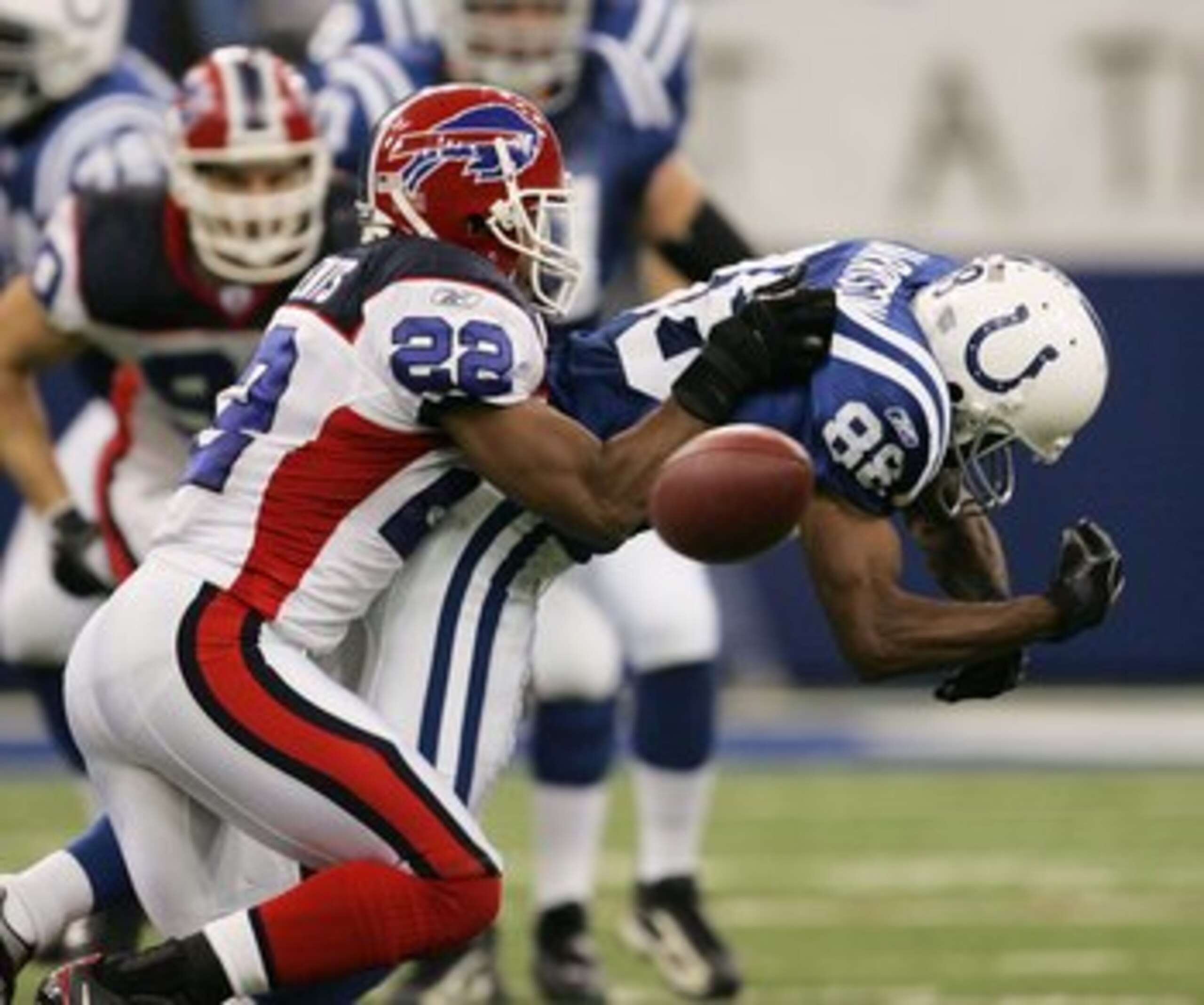 INDIANAPOLIS - NOVEMBER 12:  Nate Clements #22 of the Buffalo Bills breaks up a pass intended for Marvin Harrison #88 of the Indianapolis Colts November 12, 2006 at the RCA Dome in Indianapolis, Indiana. The Colts defeated the Bills, 17-16.  (Photo by Jon