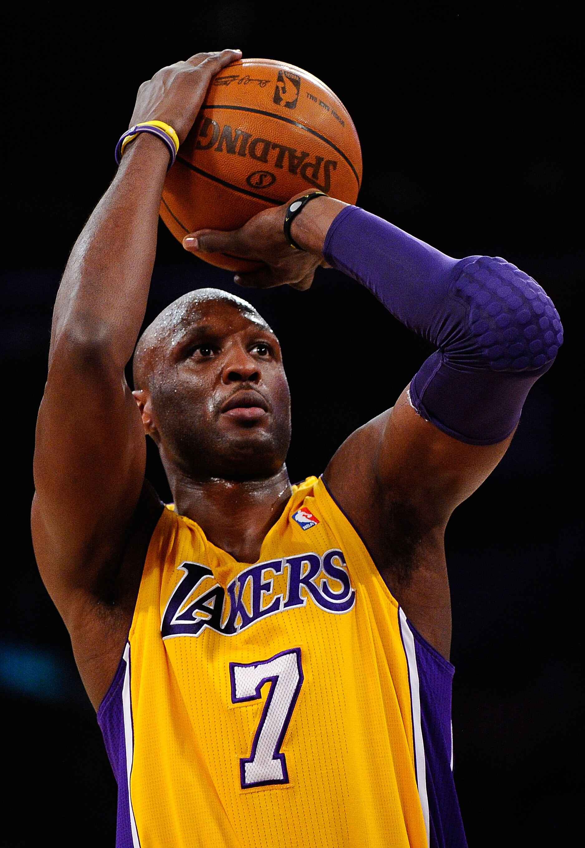 LOS ANGELES, CA - APRIL 20:  Lamar Odom #7 of the Los Angeles Lakers shoots a free throw while taking on the New Orleans Hornets in Game Two of the Western Conference Quarterfinals in the 2011 NBA Playoffs on April 20, 2011 at Staples Center in Los Angele