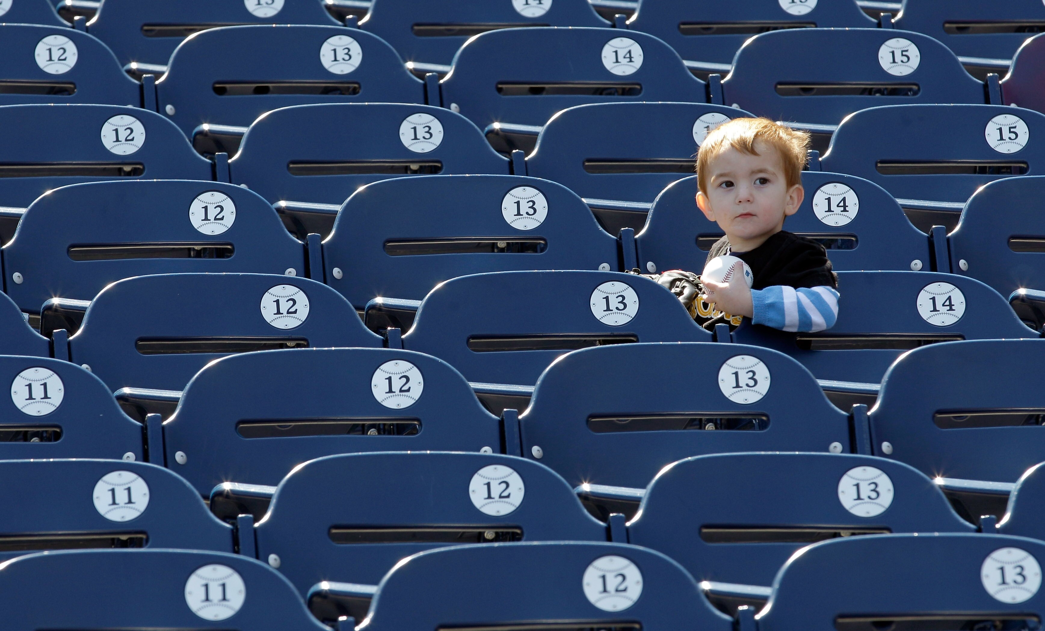 WASHINGTON, DC - APRIL 17:  A young baseball fan waits to get autographs before the start of the Milwaukee Brewers and Washington Nationals game at Nationals Park on April 17, 2011 in Washington, DC.  (Photo by Rob Carr/Getty Images)