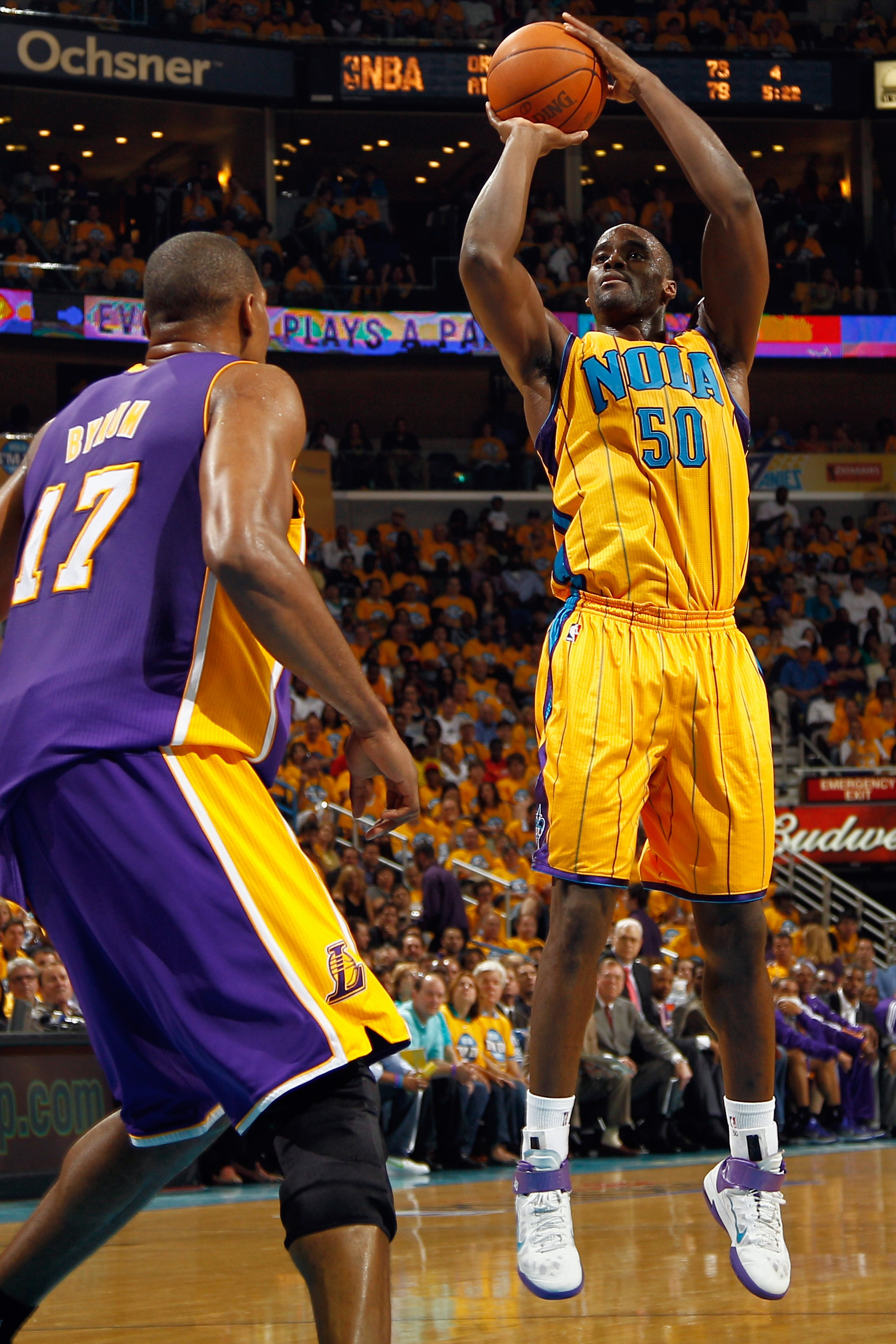 NEW ORLEANS, LA - APRIL 22:  Emeka Okafor #50  of the New Orleans Hornets shoots the ball over Andrew Bynum #17 of the Los Angeles Lakers in Game Three of the Western Conference Quarterfinals in the 2011 NBA Playoffs at the New Orleans Arena  on April 22,