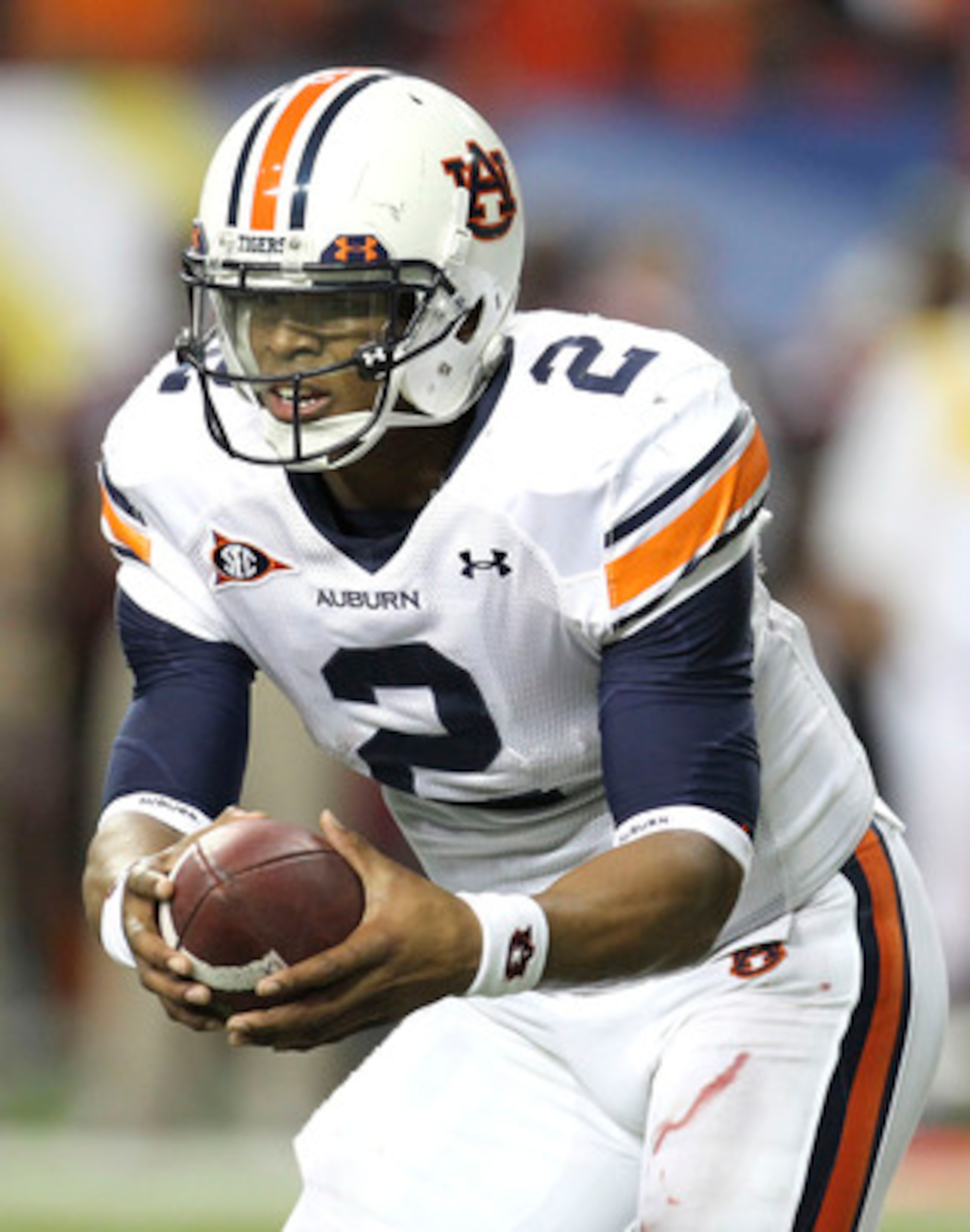 ATLANTA - DECEMBER 04: Quarterback Cam Newton #2 of the Auburn Tigers runs with the ball during the 2010 SEC Championship against the South Carolina Gamecocks at Georgia Dome on December 4, 2010 in Atlanta, Georgia. (Photo by Mike Zarrilli/Getty Images) ATLANTA - DECEMBER 04: Quarterback Cam Newton #2 of the Auburn Tigers runs with the ball during the 2010 SEC Championship against the South Carolina Gamecocks at Georgia Dome on December 4, 2010 in Atlanta, Georgia. (Photo by Mike Zarrilli/Getty Images)