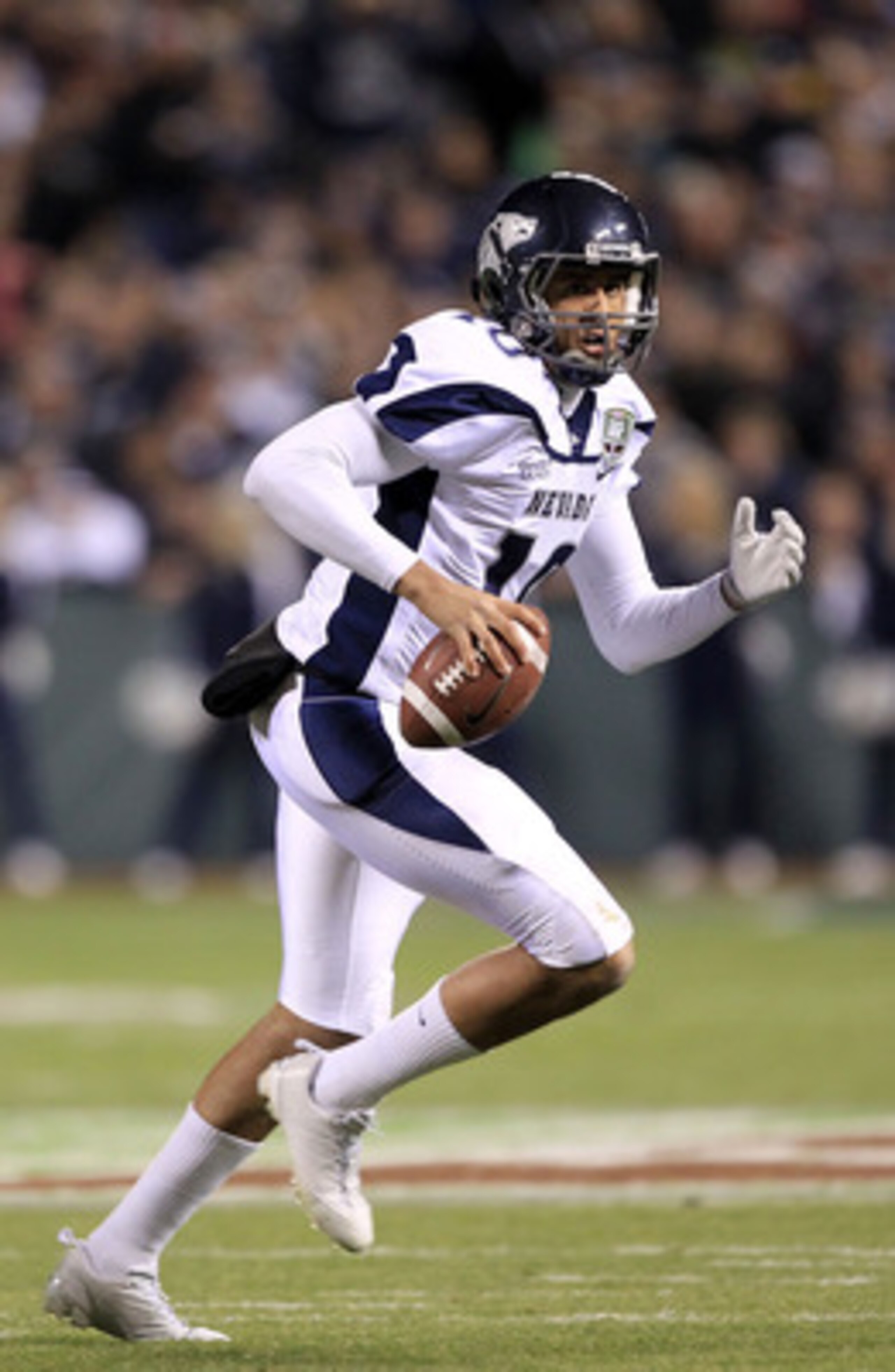 SAN FRANCISCO, CA - JANUARY 09: Colin Kaepernick #10 of the Nevada Wolf Pack looks to pass the ball against Boston College during the Kraft Fight Hunger Bowl at AT&T Park on January 9, 2011 in San Francisco, California. (Photo by Ezra Shaw/Getty Images) SAN FRANCISCO, CA - JANUARY 09: Colin Kaepernick #10 of the Nevada Wolf Pack looks to pass the ball against Boston College during the Kraft Fight Hunger Bowl at AT&T Park on January 9, 2011 in San Francisco, California. (Photo by Ezra Shaw/Getty Images)