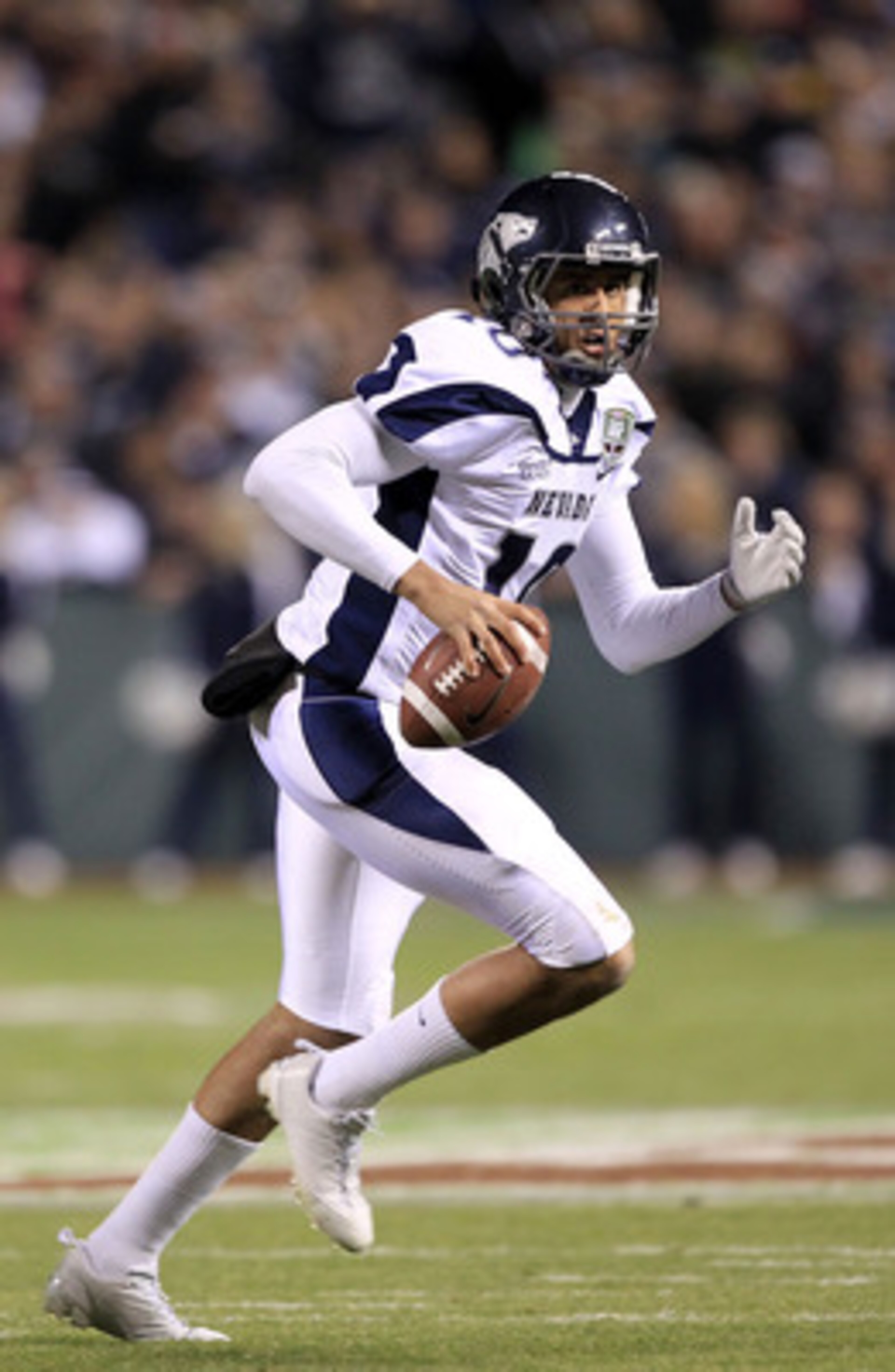 SAN FRANCISCO, CA - JANUARY 09: Colin Kaepernick #10 of the Nevada Wolf Pack looks to pass the ball against Boston College during the Kraft Fight Hunger Bowl at AT&T Park on January 9, 2011 in San Francisco, California. (Photo by Ezra Shaw/Getty Images) SAN FRANCISCO, CA - JANUARY 09: Colin Kaepernick #10 of the Nevada Wolf Pack looks to pass the ball against Boston College during the Kraft Fight Hunger Bowl at AT&T Park on January 9, 2011 in San Francisco, California. (Photo by Ezra Shaw/Getty Images)