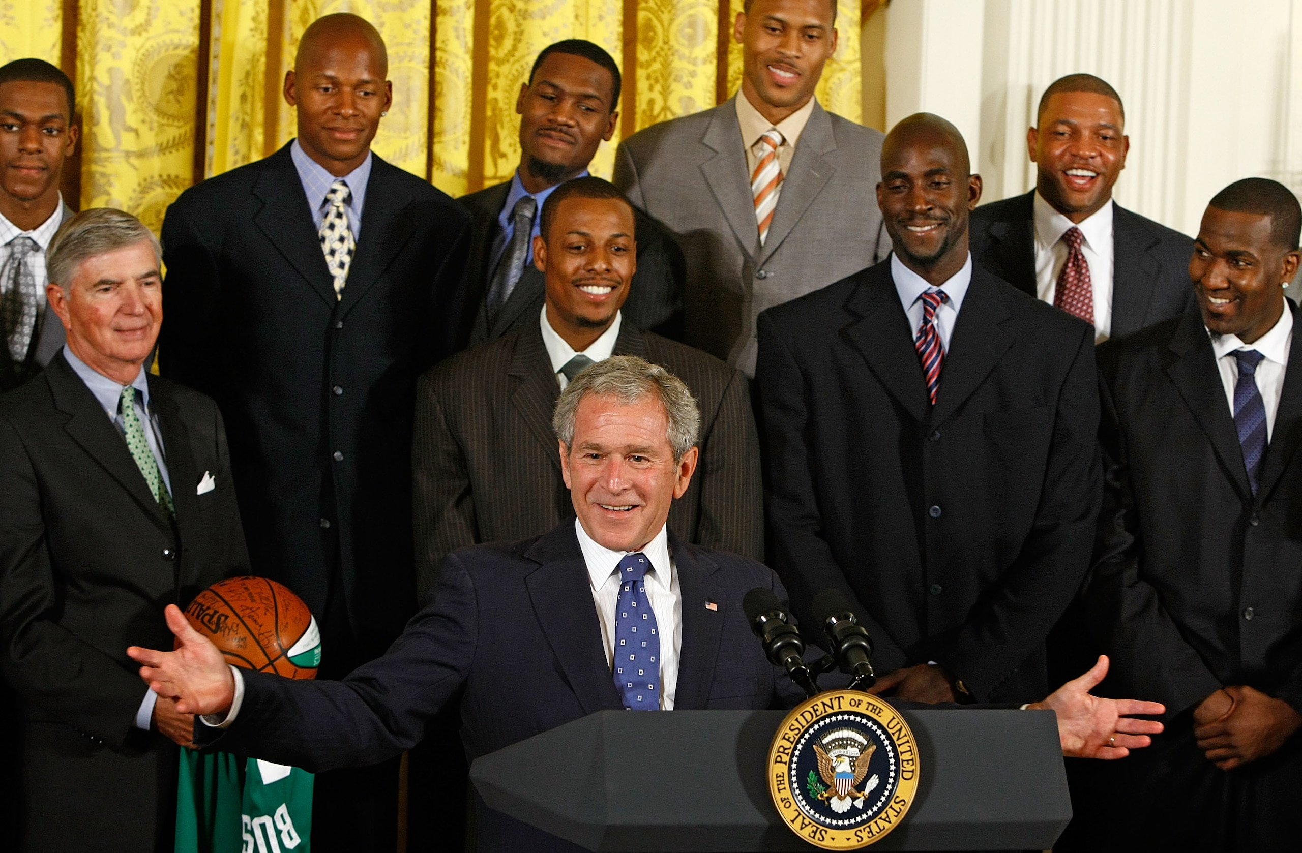 WASHINGTON - SEPTEMBER 19:  U.S. President George W. Bush (C) congratulates the National Basketball Association champion Boston Celtics including (back row L-R) Rajon Rondo, Ray Allen, Tony Allen, PJ Brown, head coach Doc Rivers, (middle row L-R) managing