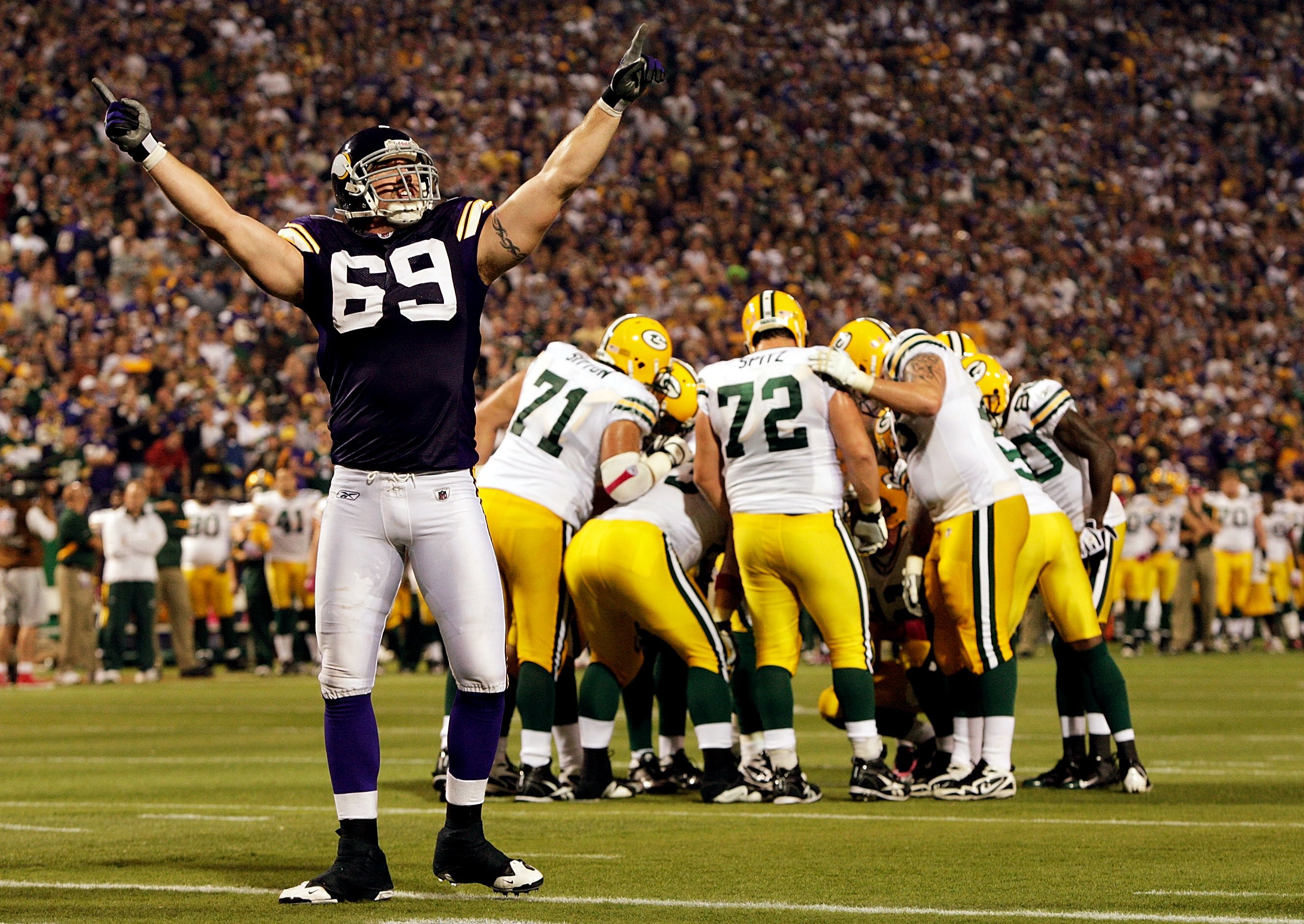 MINNEAPOLIS - OCTOBER 05:  Defensive end Jared Allen #69 of the Minnesota Vikings pumps up the crowd during the Monday Night Football game against the Green Bay Packers on October 5, 2009 at Hubert H. Humphrey Metrodome in Minneapolis, Minnesota.  (Photo